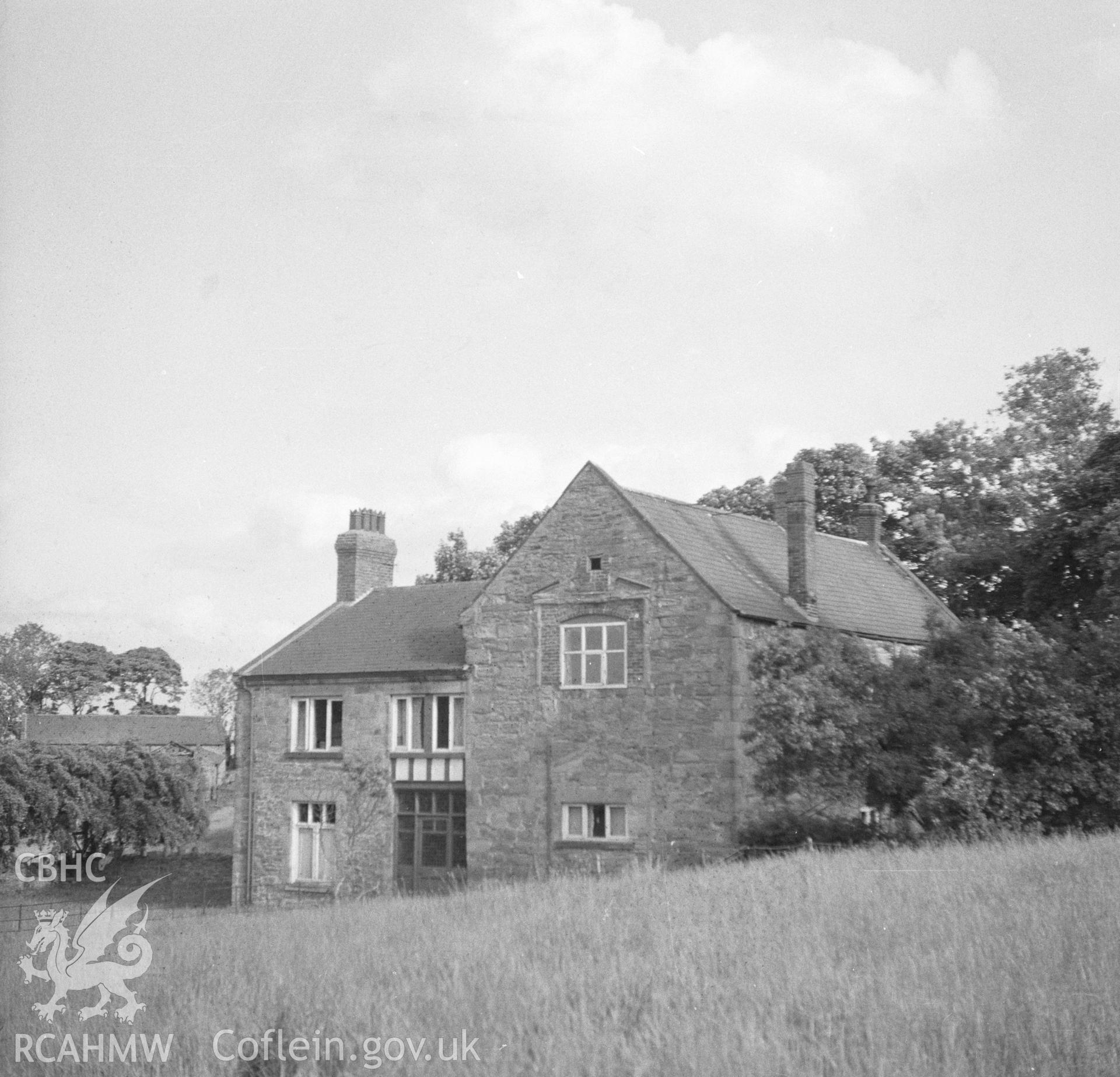 Digital copy of a back and white nitrate negative showing view of Llyseurgain in its setting.