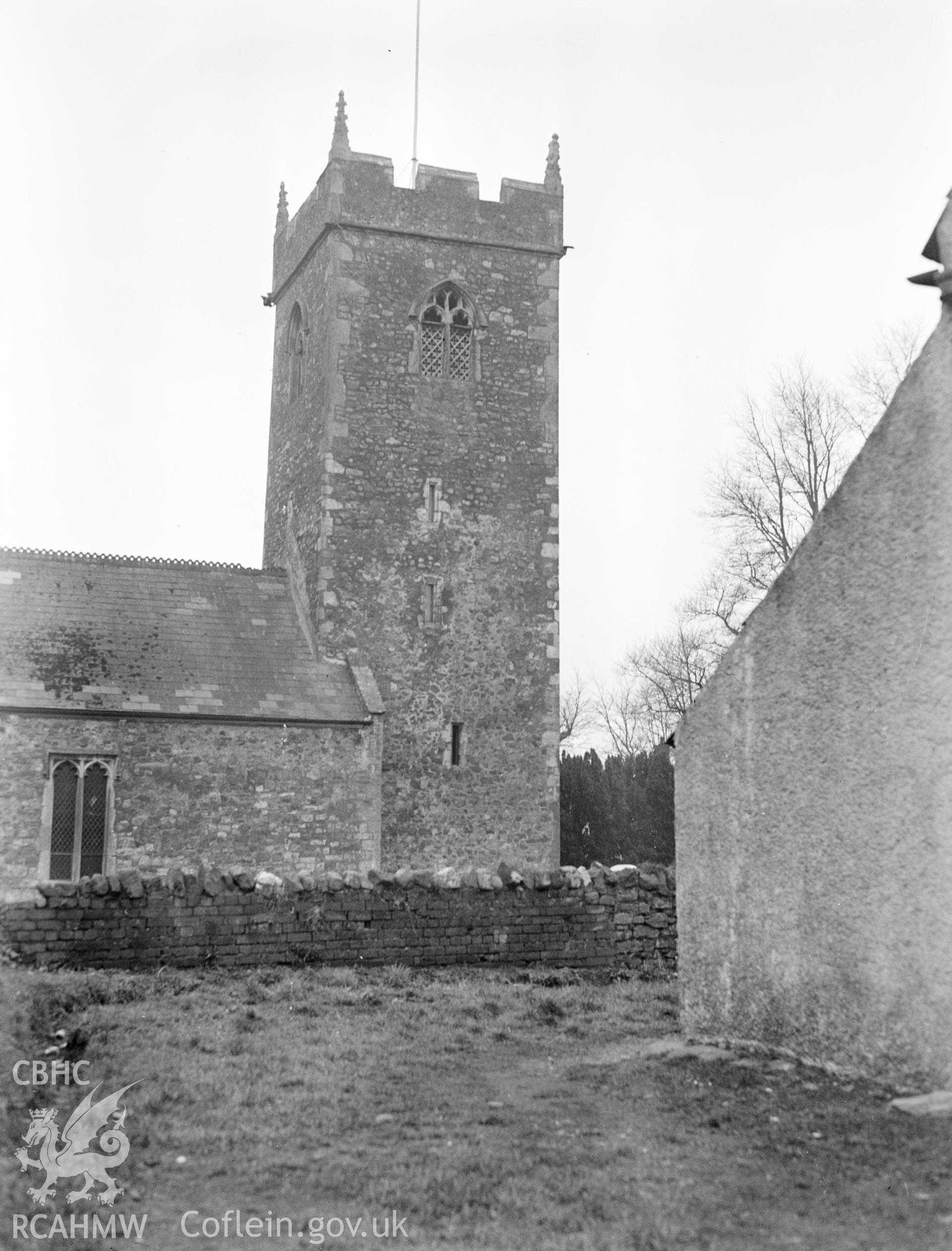 Digital copy of a nitrate negative showing exterior view of side elevation of church and tower, St Augustine's Church, Rumney, taken circa 1936. From the National Building Record Postcard Collection.