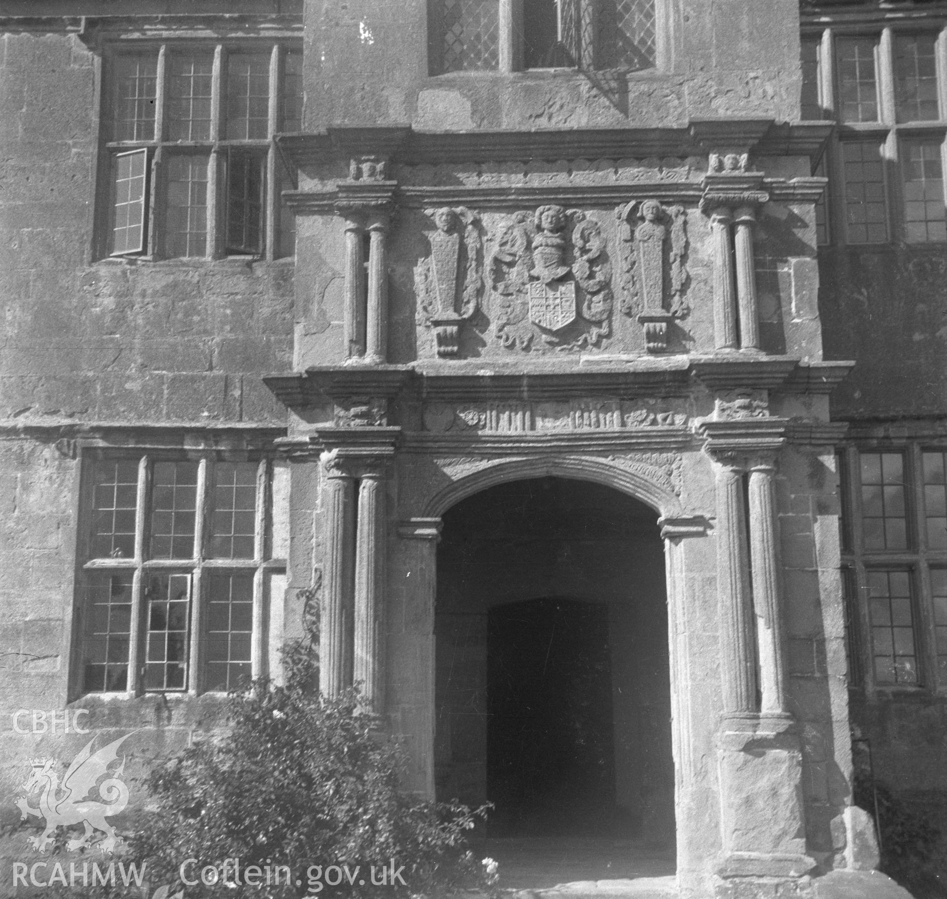 Digital copy of an undated nitrate negative showing exterior view of entrance porch  to Treowen, Monmouthshire.