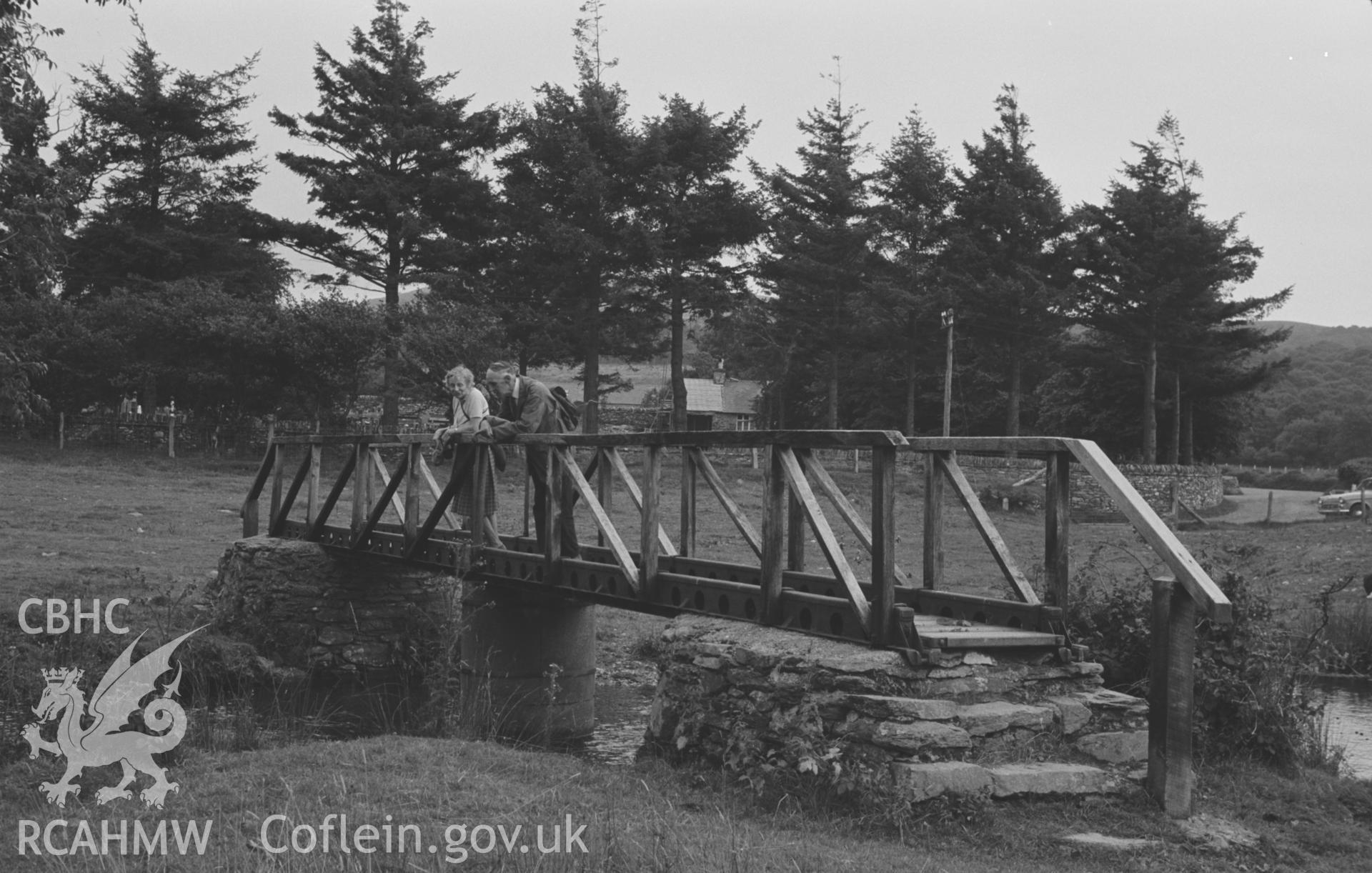Digital copy of a black and white negative showing footbridge over the Teifi at Strata Florida. Photographed by Arthur O. Chater on 25th August 1967, looking south from Grid Reference SN 746 658.