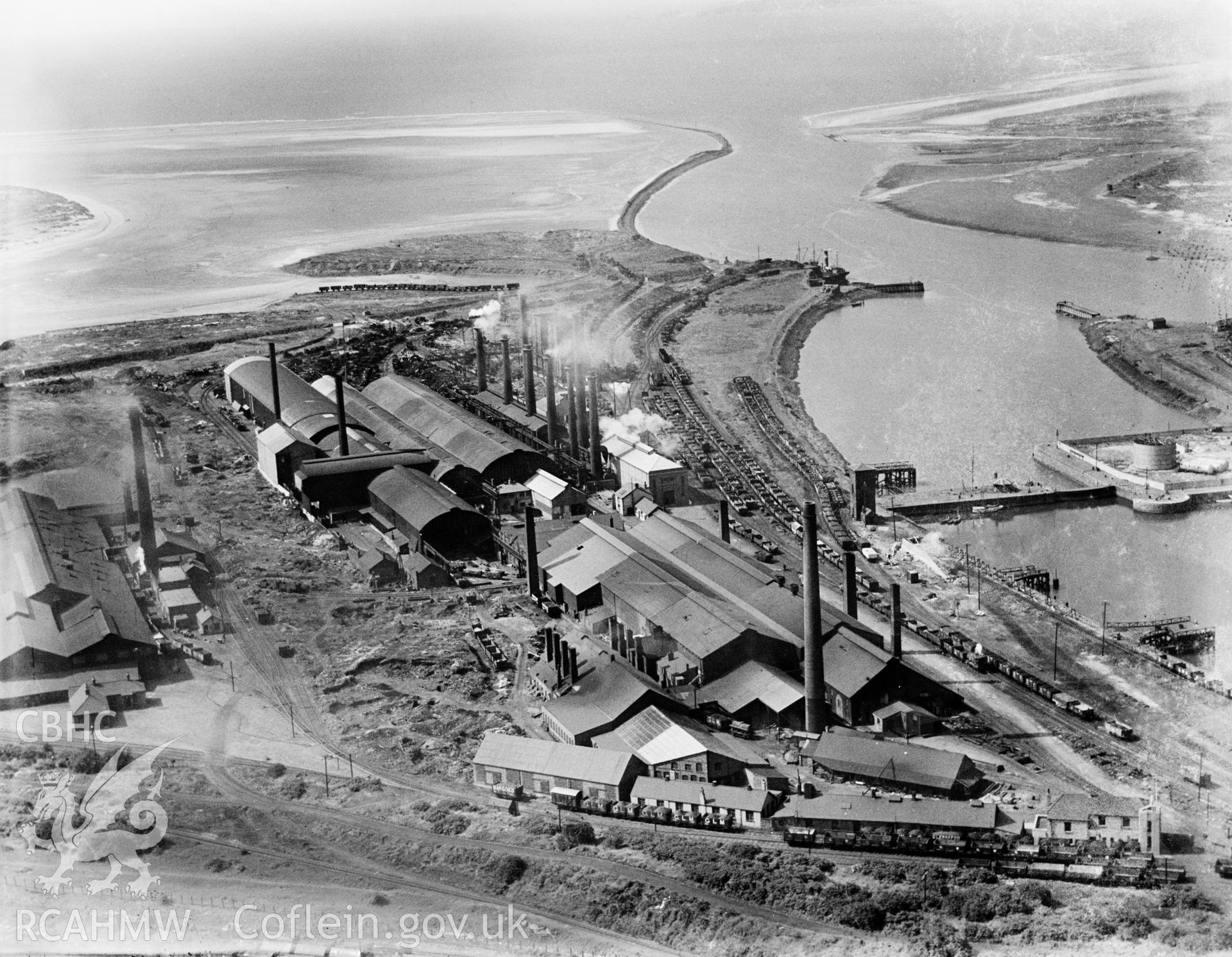 View of Briton Ferry showing the docks and steelworks, oblique aerial view. 5?x4? black and white glass plate negative.