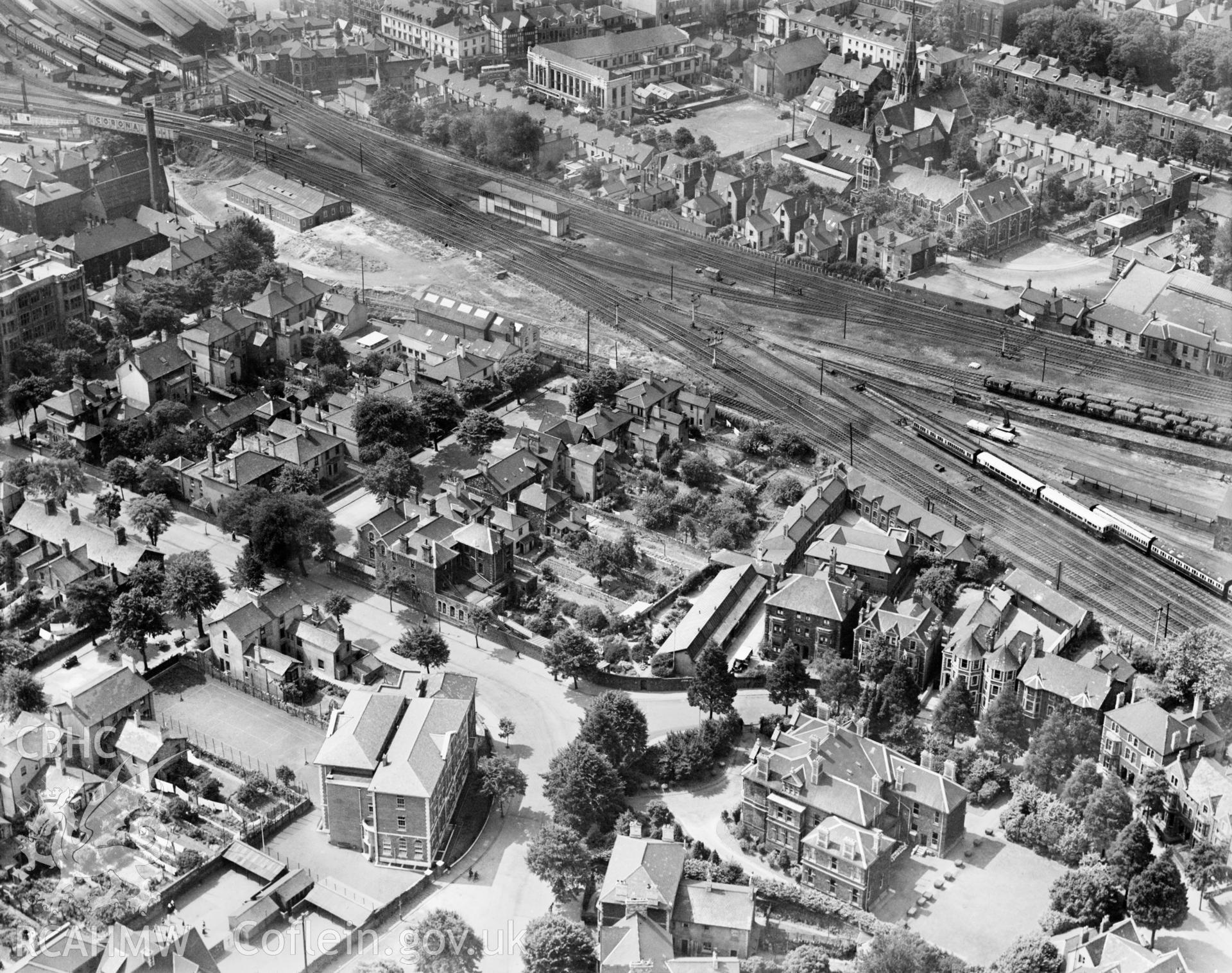 View of central Cardiff, showing Heathfield House catholic school, Mansion House and the Prince of Wales hospital, oblique aerial view. 5?x4? black and white glass plate negative.