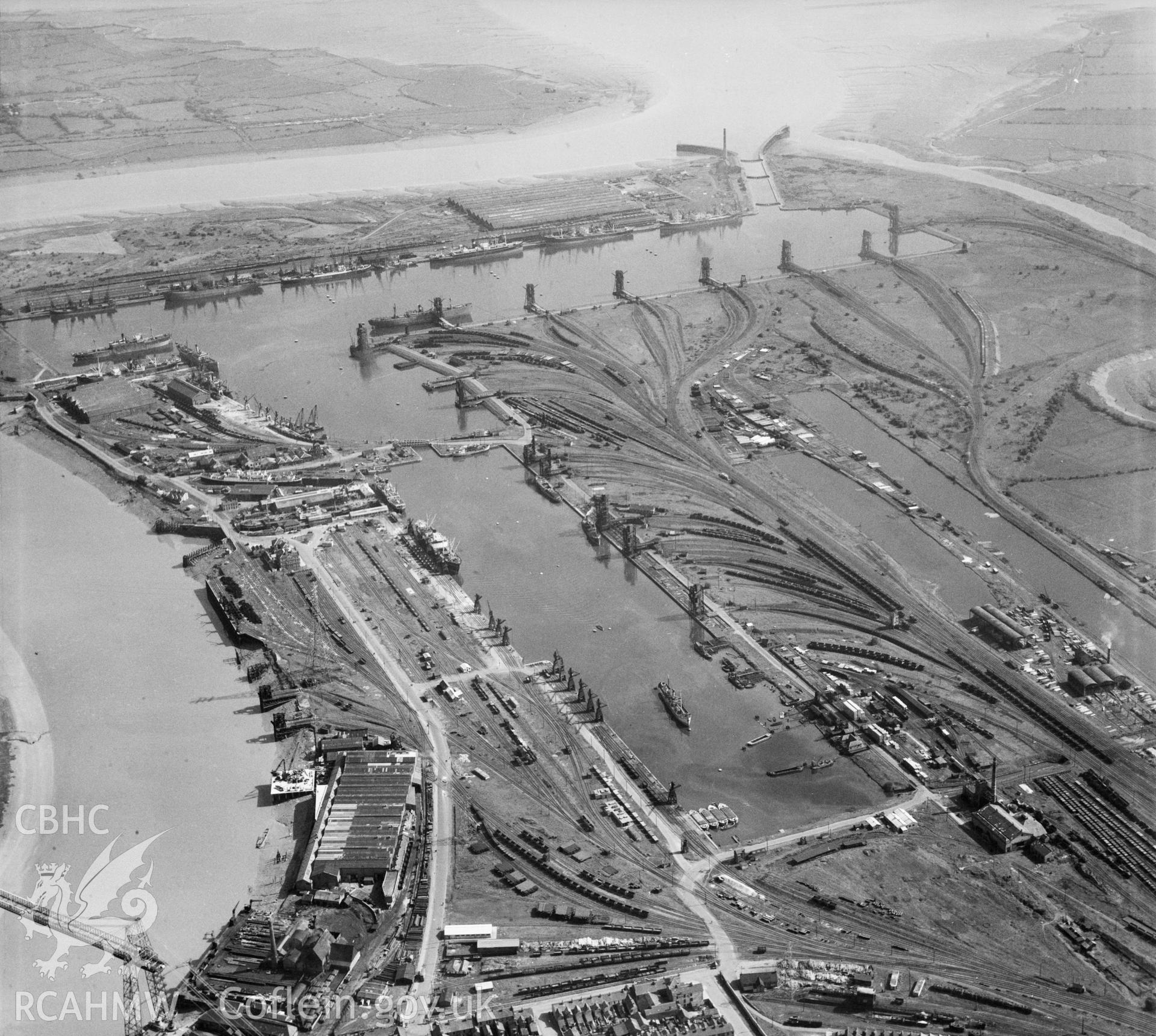 Black and white oblique aerial photograph showing Newport Docks, from Aerofilms album Monmouthshire N-Pe (448), taken by Aerofilms Ltd and dated 1947.