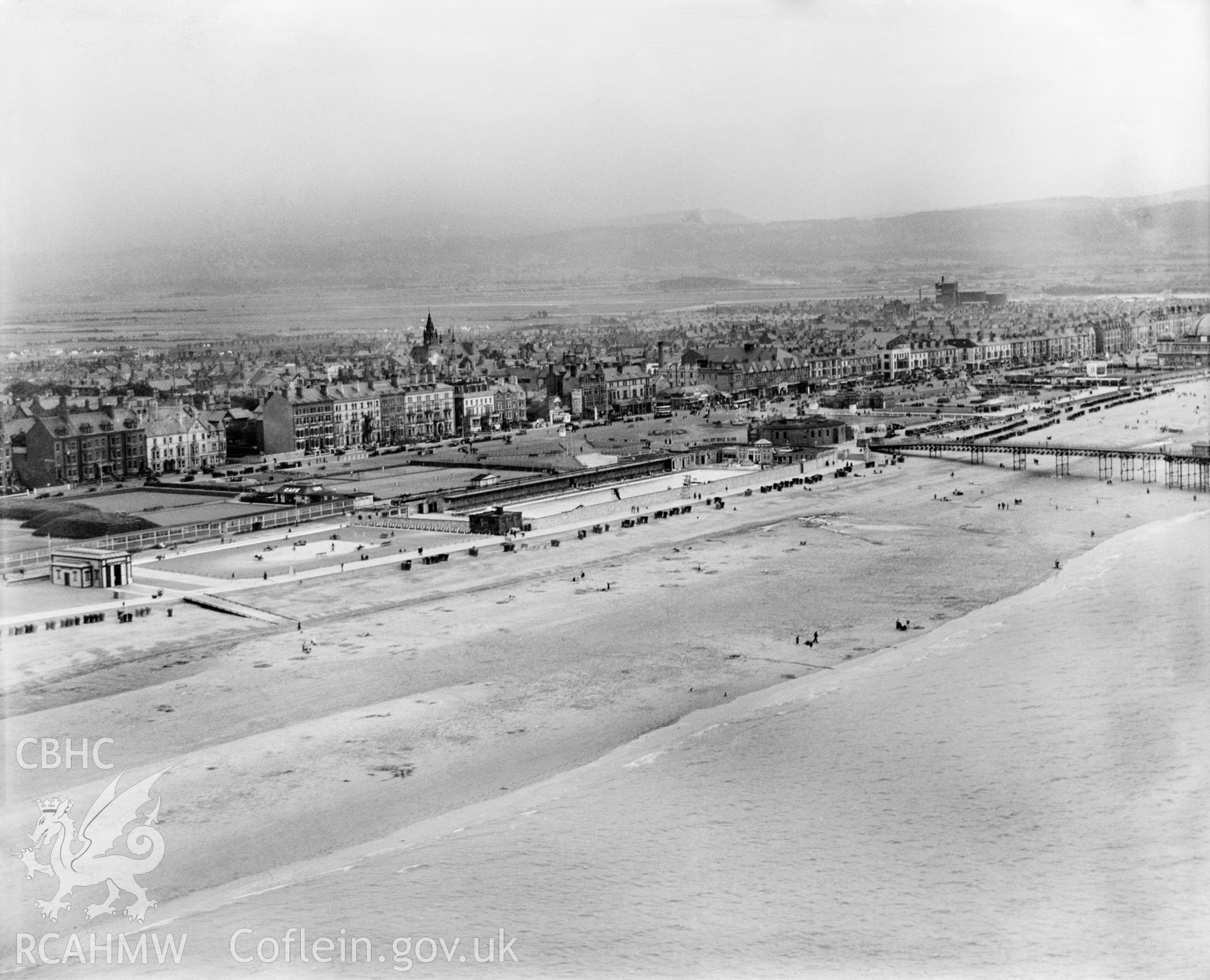 View of Rhyl showing pier and swimming pools, oblique aerial view. 5?x4? black and white glass plate negative.