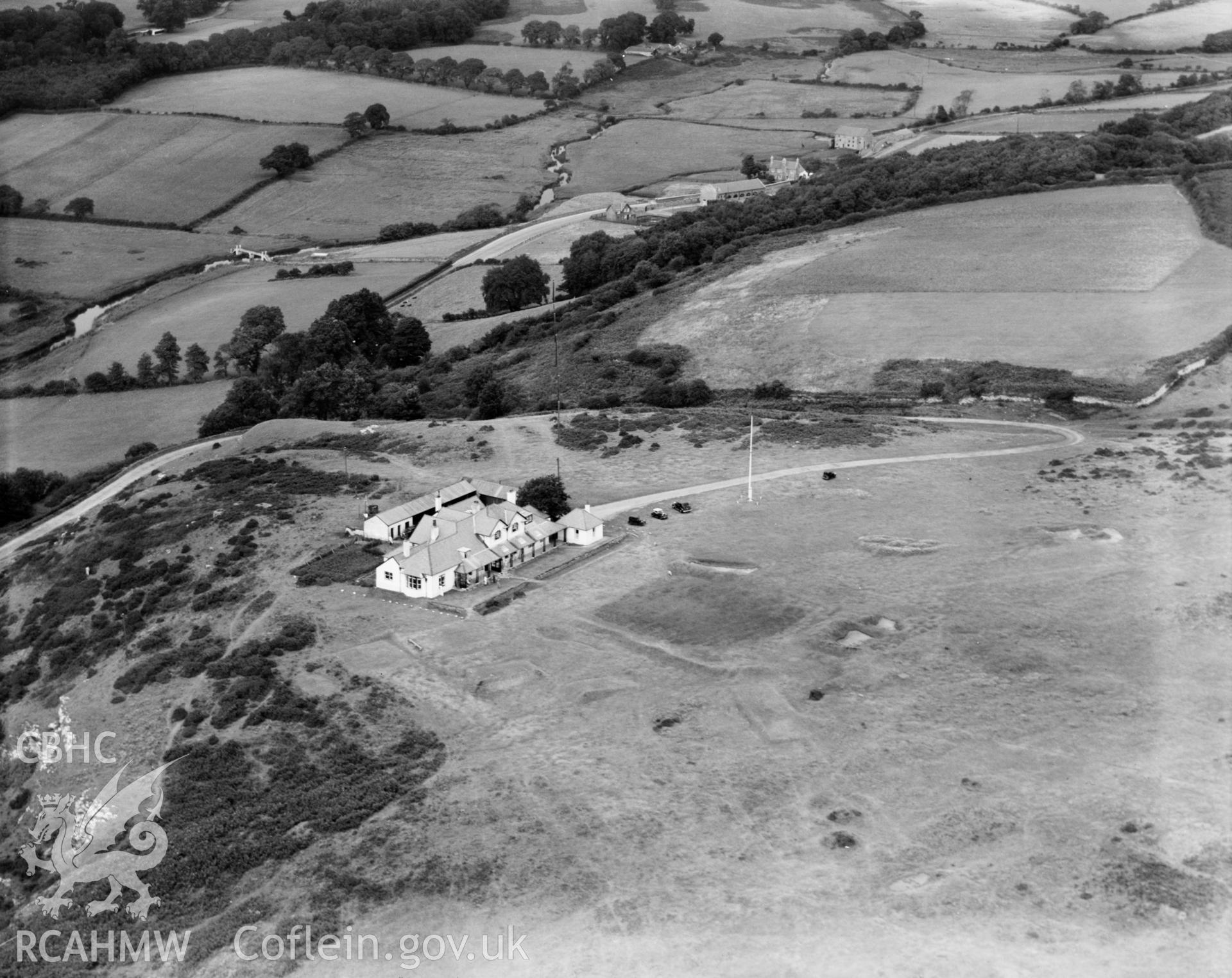 View of Ogmore-by-Sea, showing Southerndown golf course, oblique aerial view. 5?x4? black and white glass plate negative.