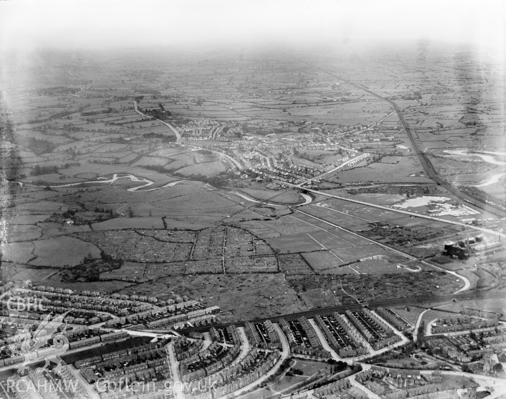View of Cardiff showing the area near Rumney and Pengam Moor and allotment gardens, oblique aerial view. 5?x4? black and white glass plate negative.