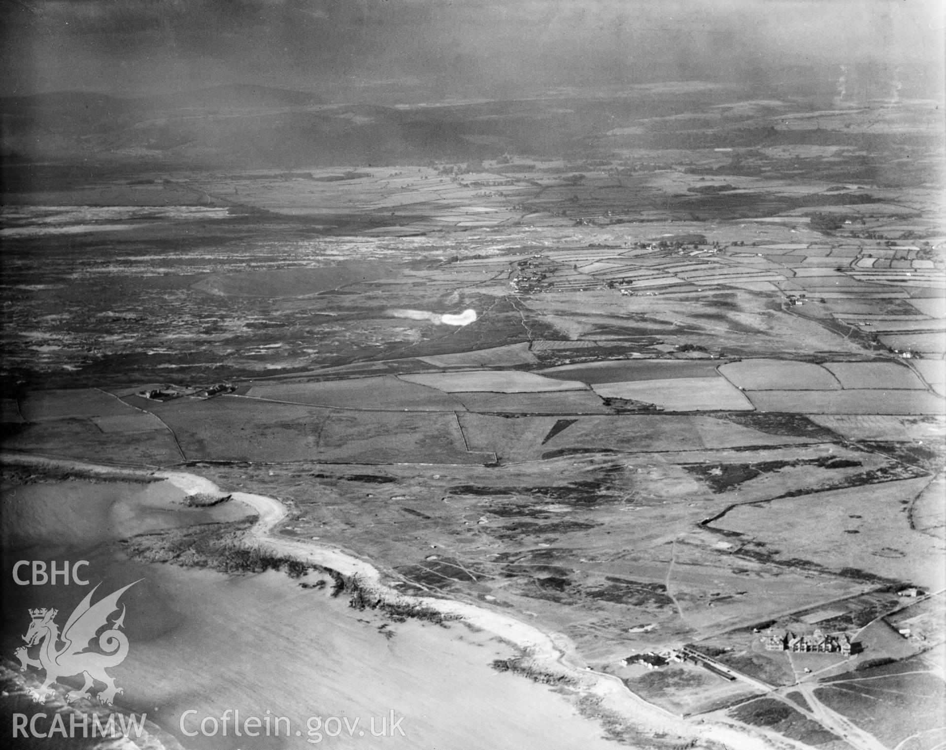 View of Ogmore-by-Sea, showing Southerndown golf course, oblique aerial view. 5?x4? black and white glass plate negative.