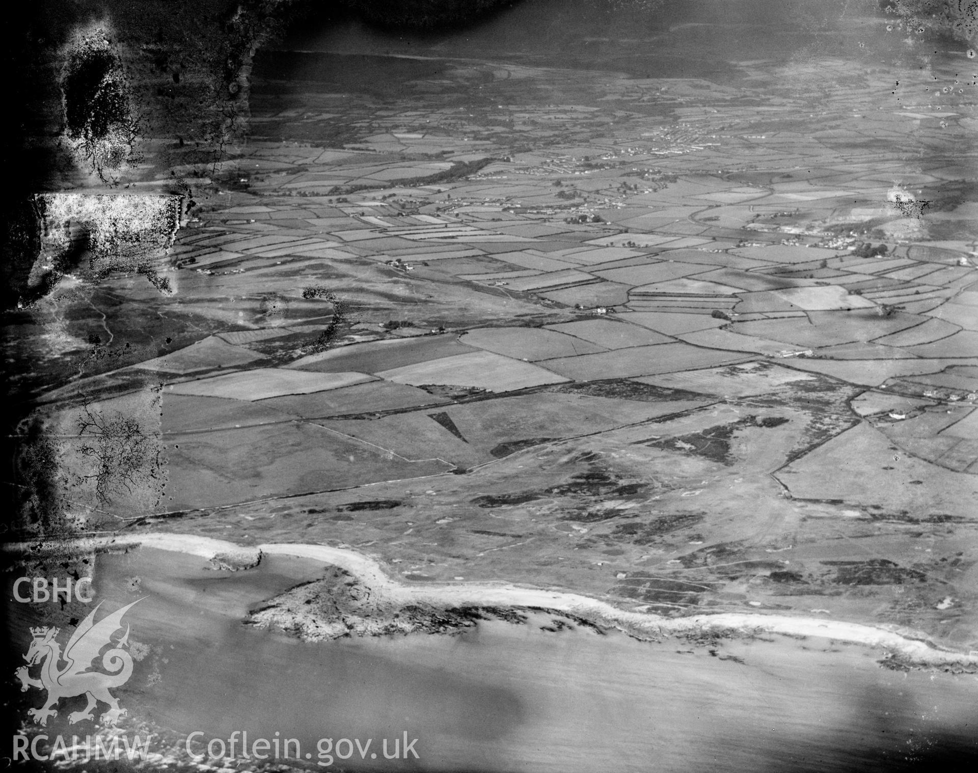 View of Ogmore-by-Sea, showing Southerndown golf course, oblique aerial view. 5?x4? black and white glass plate negative.