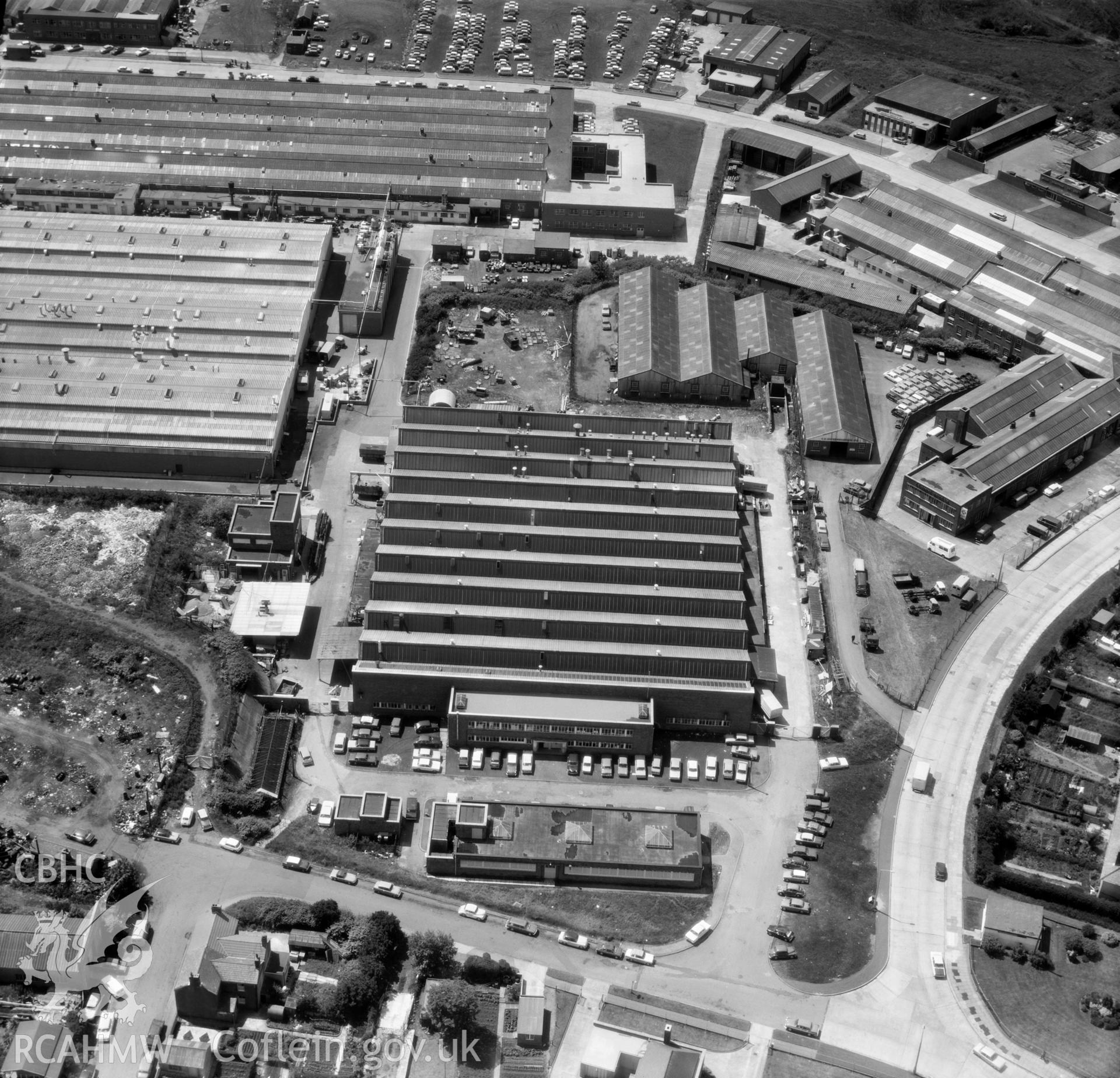 Black and white oblique aerial photograph showing the Mettoy Factory, Fforest Fach Industrial Estate, from Aerofilms album no. W.30, taken by Aerofilms Ltd. and dated 22/6/1972.