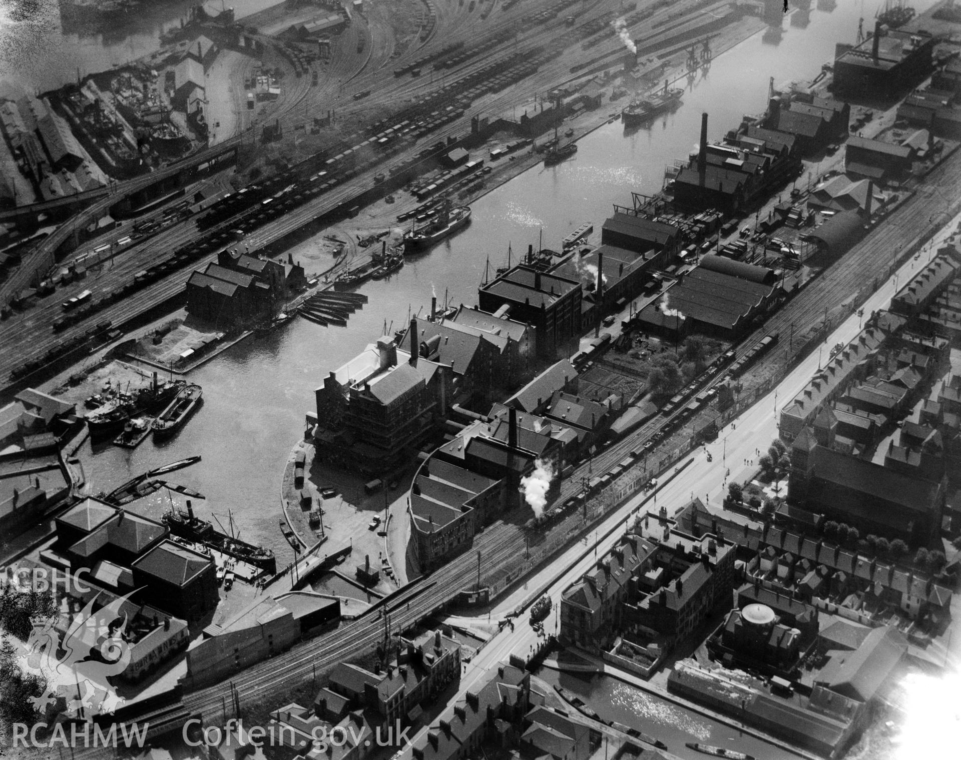 View of Bute East Dock, Cardiff showing the Spillers Factory, oblique aerial view. 5?x4? black and white glass plate negative.