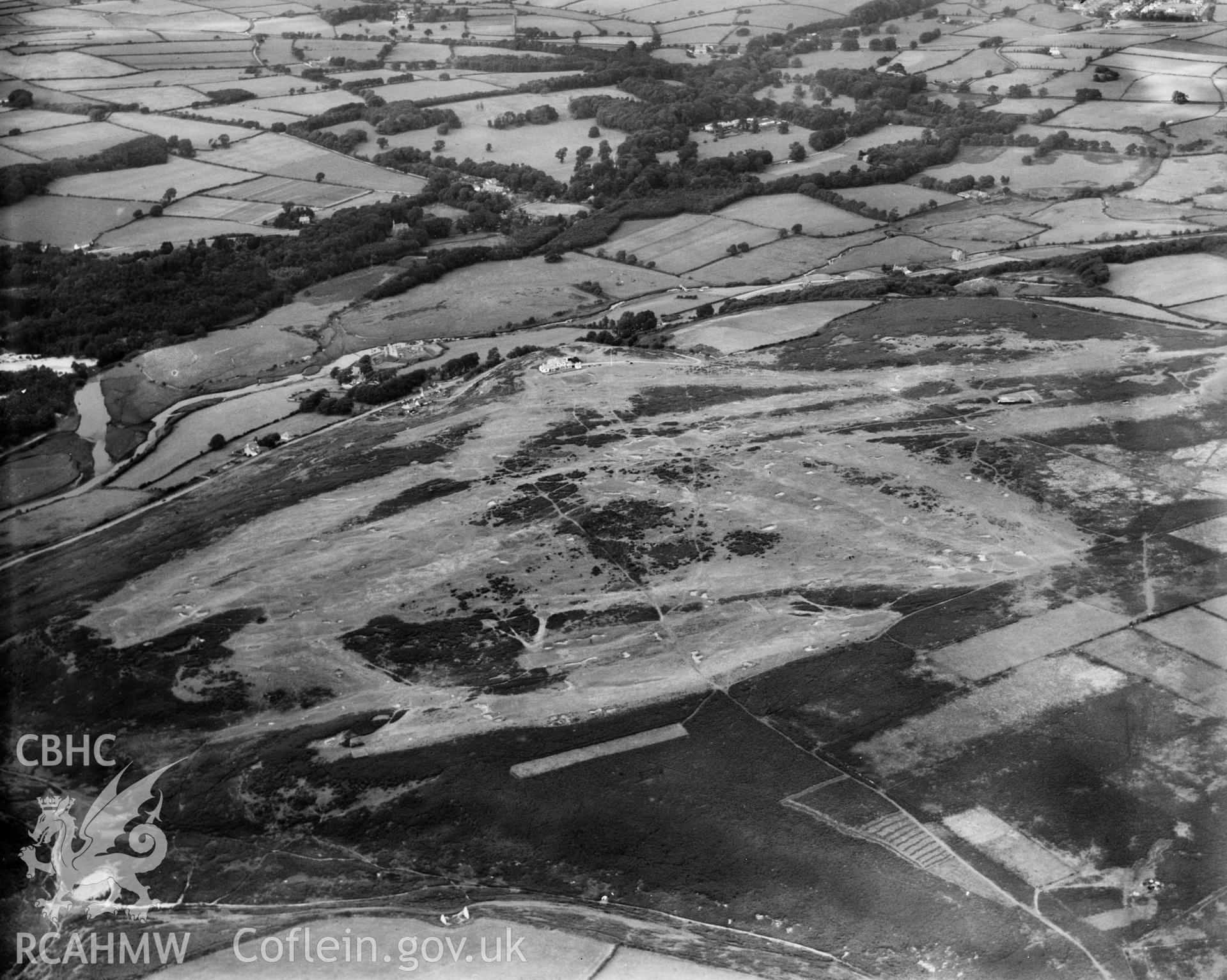 View of Ogmore-by-Sea, showing Southerndown golf course, oblique aerial view. 5?x4? black and white glass plate negative.