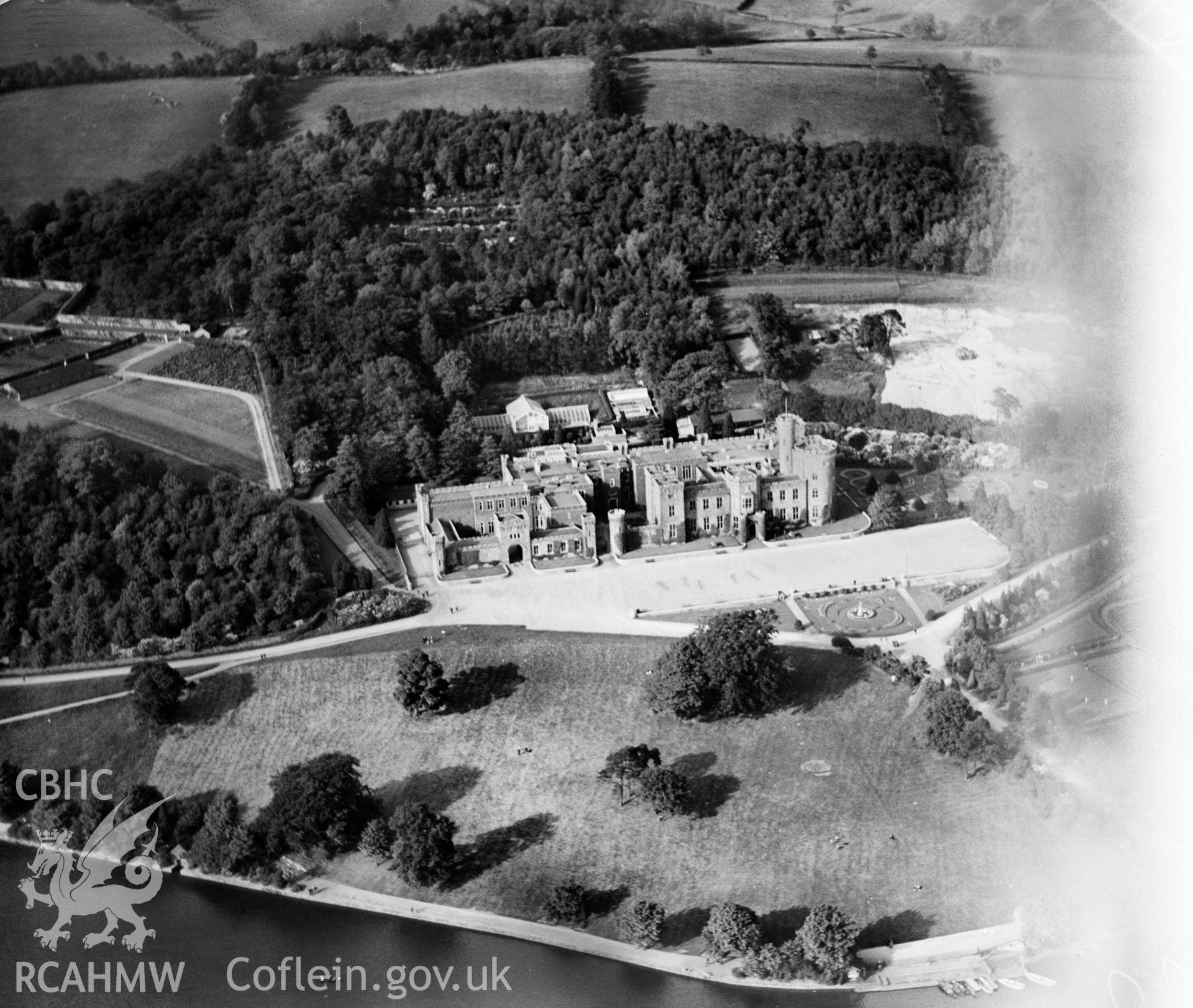 View of Cyfarthfa Castle, Merthyr Tydfil, oblique aerial view. 5?x4? black and white glass plate negative.