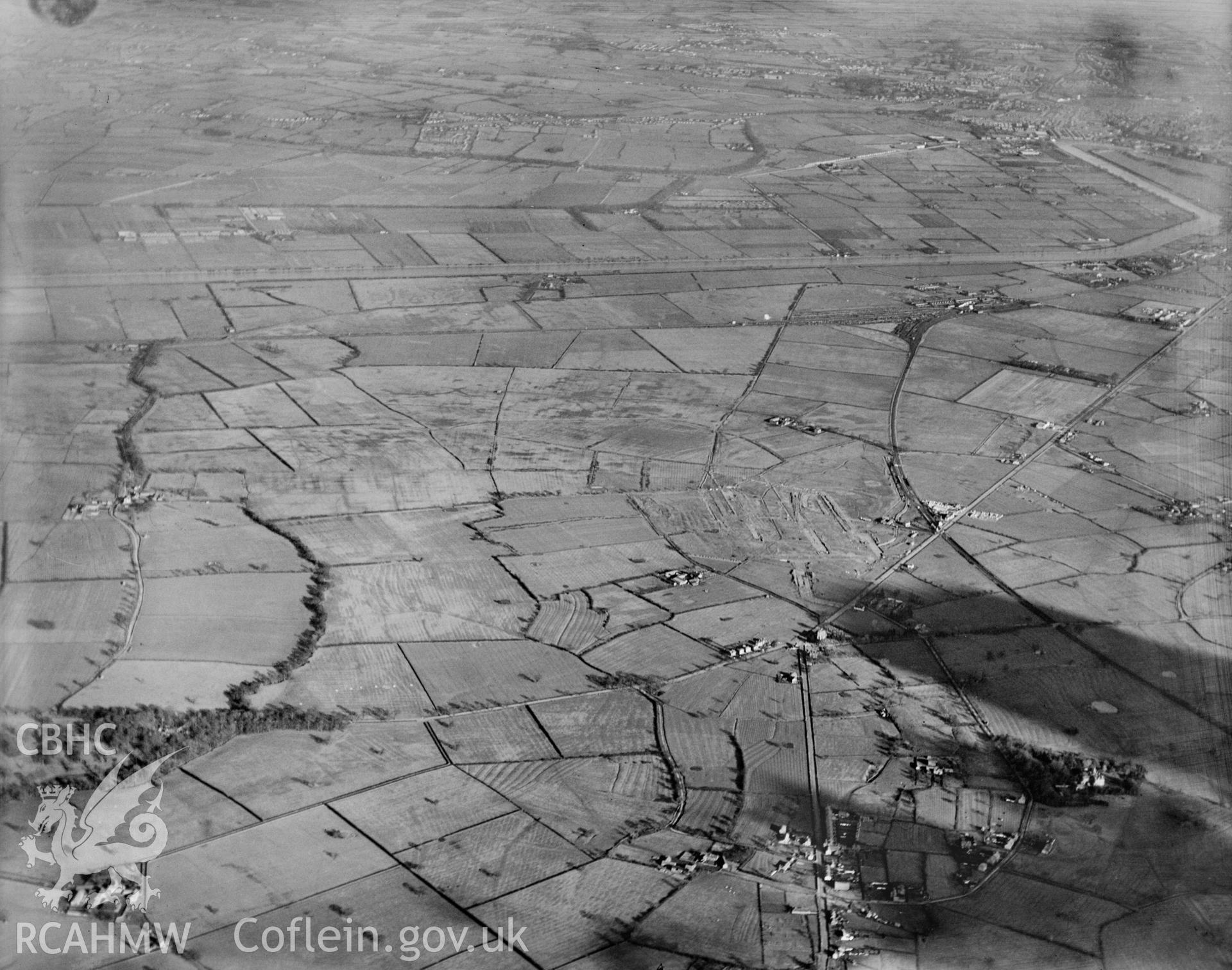 High altitude view of Vickers-Armstrong Ltd. works  - Broughton airfield under construction. Oblique aerial photograph, 5?x4? BW glass plate.