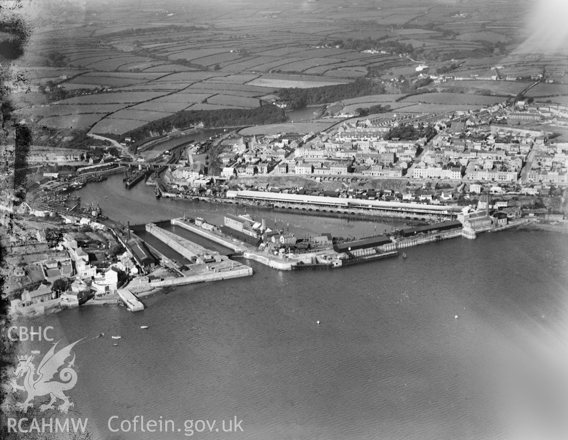 View of Milford Haven and docks, oblique aerial view. 5?x4? black and white glass plate negative.