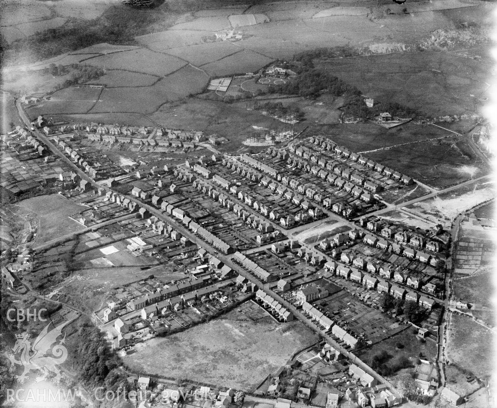 View of Clydach showing 1930's housing estate, oblique aerial view. 5?x4? black and white glass plate negative.