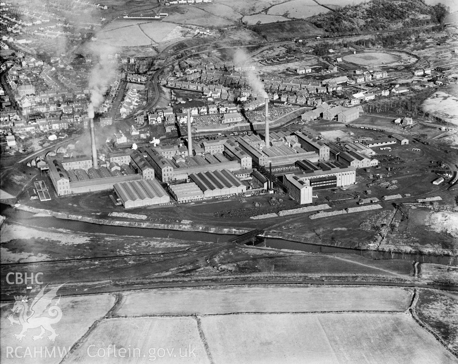 View of Mond Nickel Works, Clydach, Swansea, with Waverley Park, oblique aerial view. 5?x4? black and white glass plate negative.