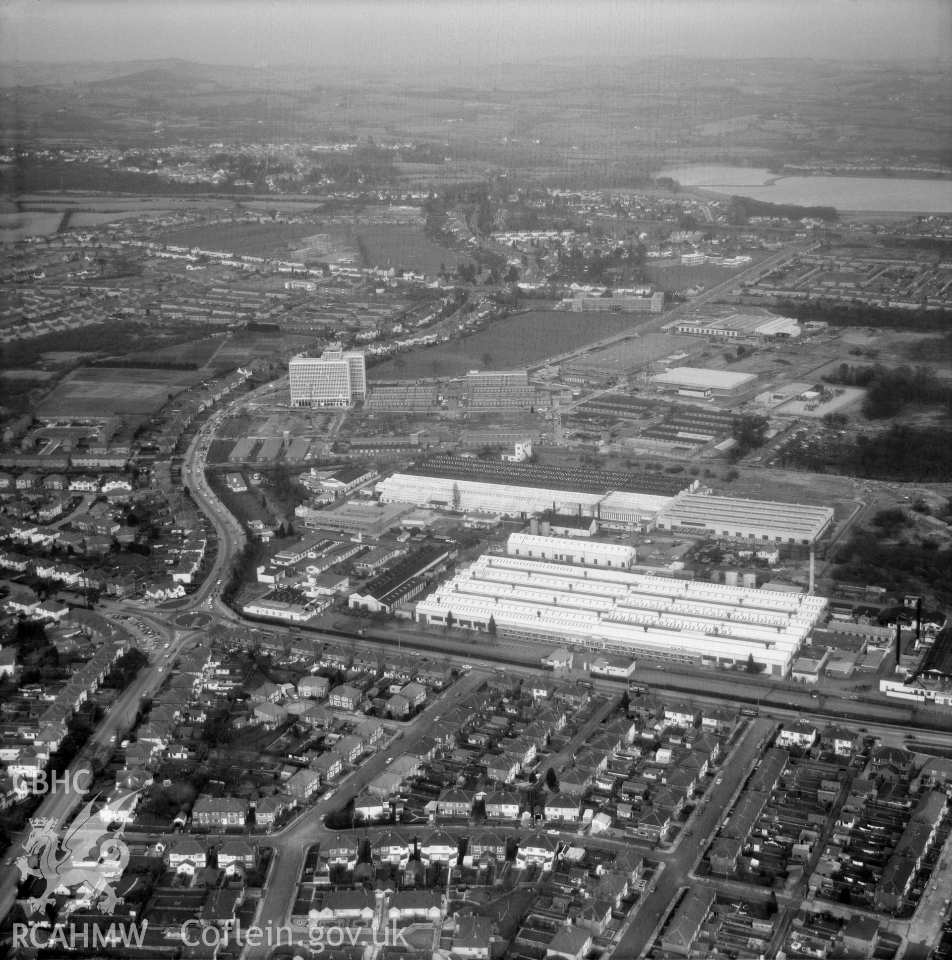 Digital copy of a black and white, oblique aerial photograph of the Cardiff Royal Ordnance factory, Llanishen. The photograph shows a view from the South West. It was originally a World War two munitions factory, it became Atomic Weapons Establishment Cardiff.