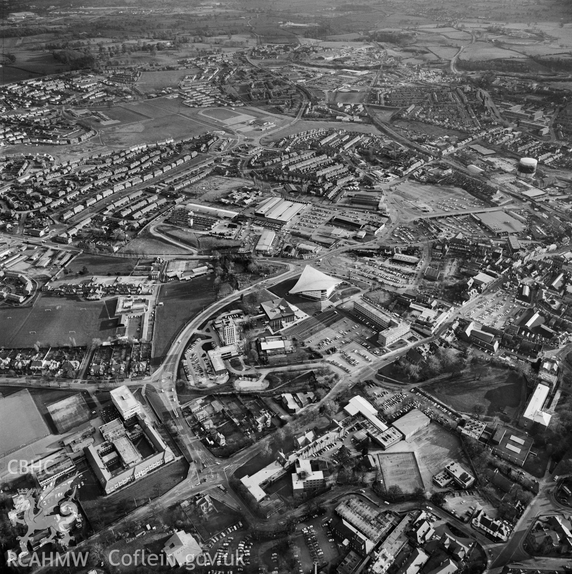 Black and white oblique aerial photograph showing the centre of   Wrexham,  from Aerofilms album, taken by Aerofilms Ltd and dated 1976.