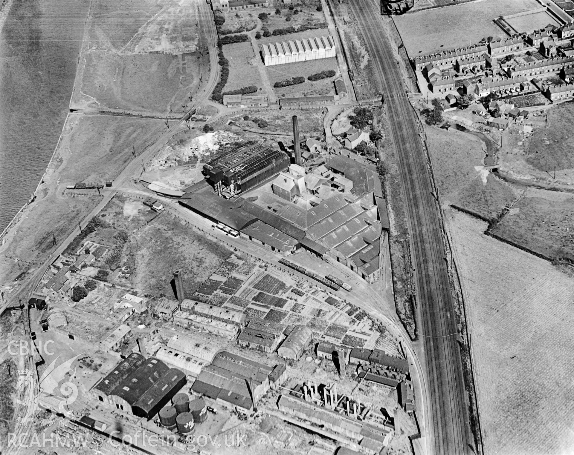 View of bone and manure works, Dee oil works and candle works at Saltney, commissioned by Edward Webb & Son. Oblique aerial photograph, 5?x4? BW glass plate.