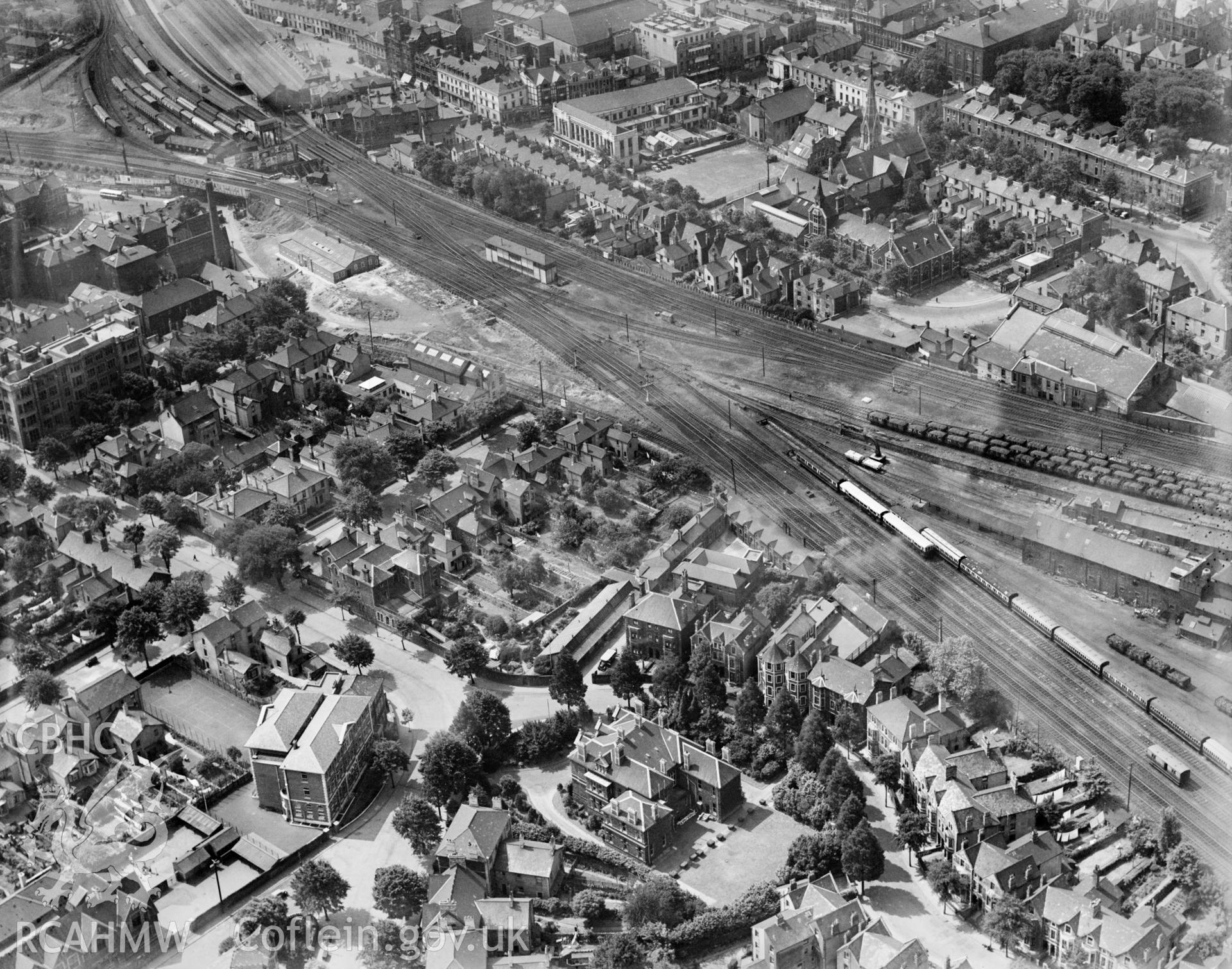 View of central Cardiff, showing Heathfield House catholic school, Mansion House and the Prince of Wales hospital, oblique aerial view. 5?x4? black and white glass plate negative.