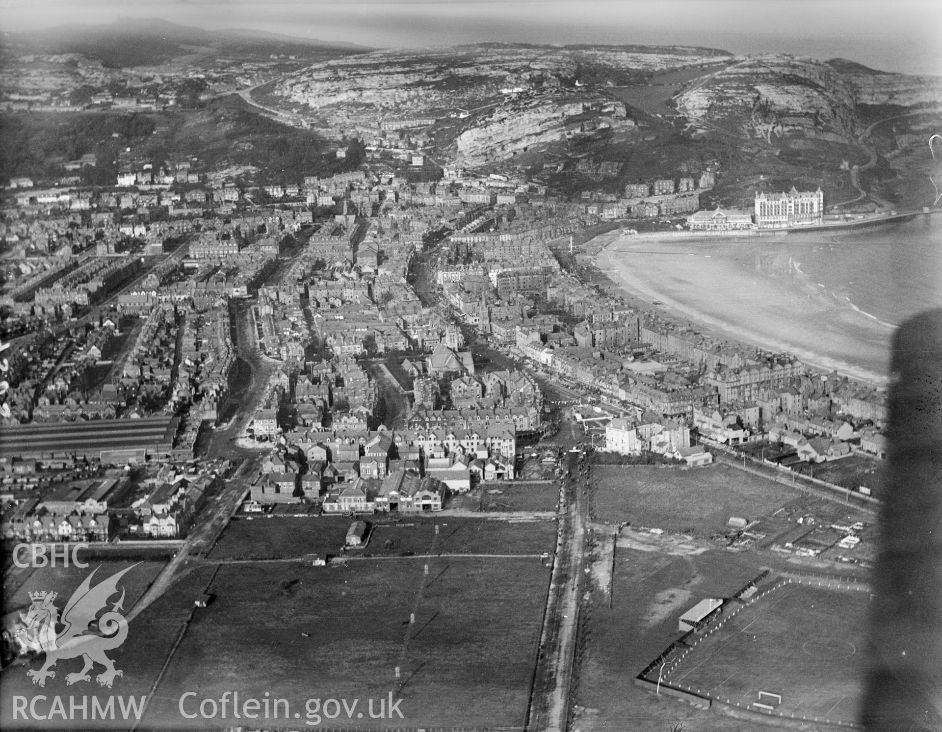 General view of Llandudno showing football ground, oblique aerial view. 5?x4? black and white glass plate negative.