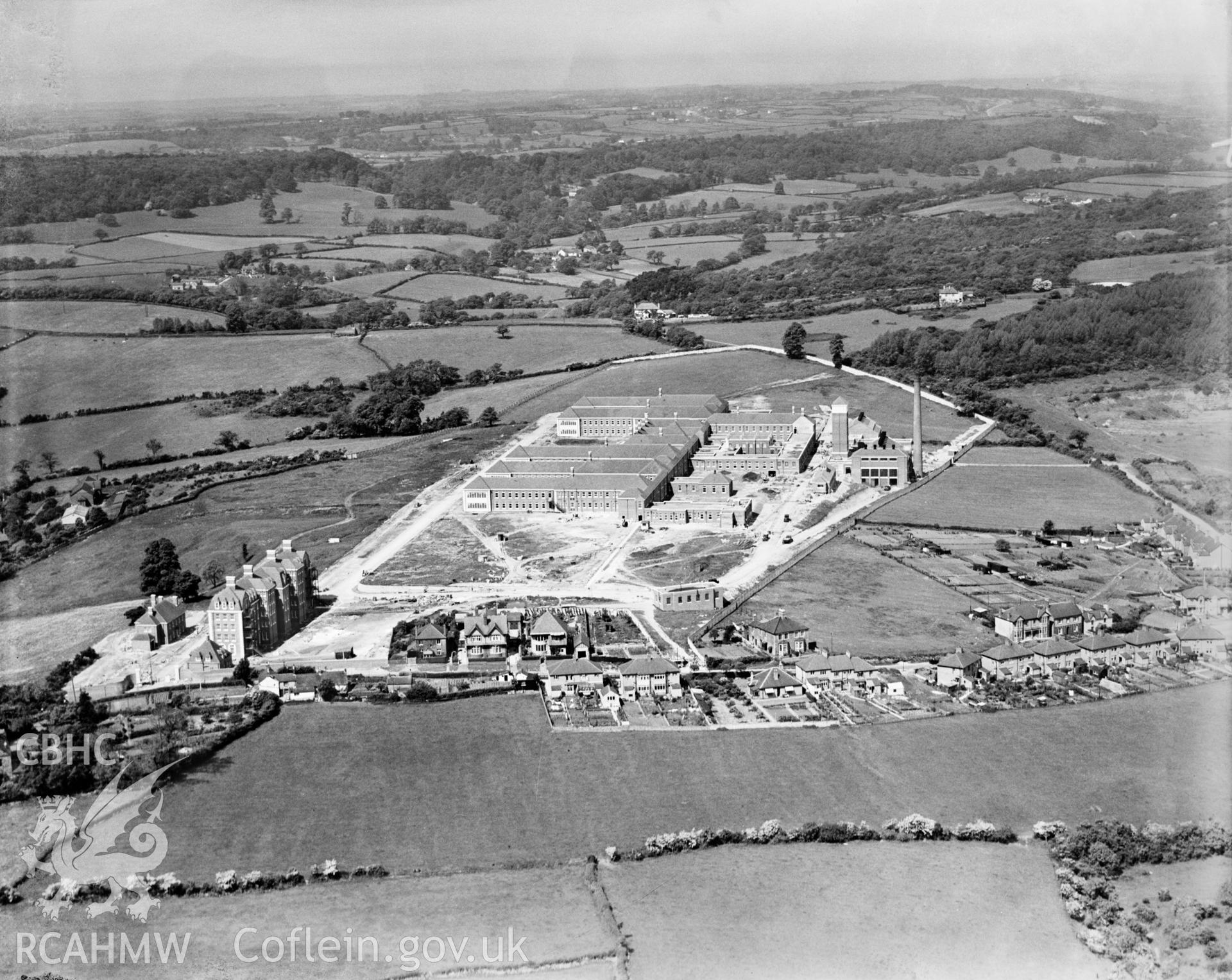 View of construction of Llandough Hospital, Penarth, oblique aerial view. 5?x4? black and white glass plate negative.