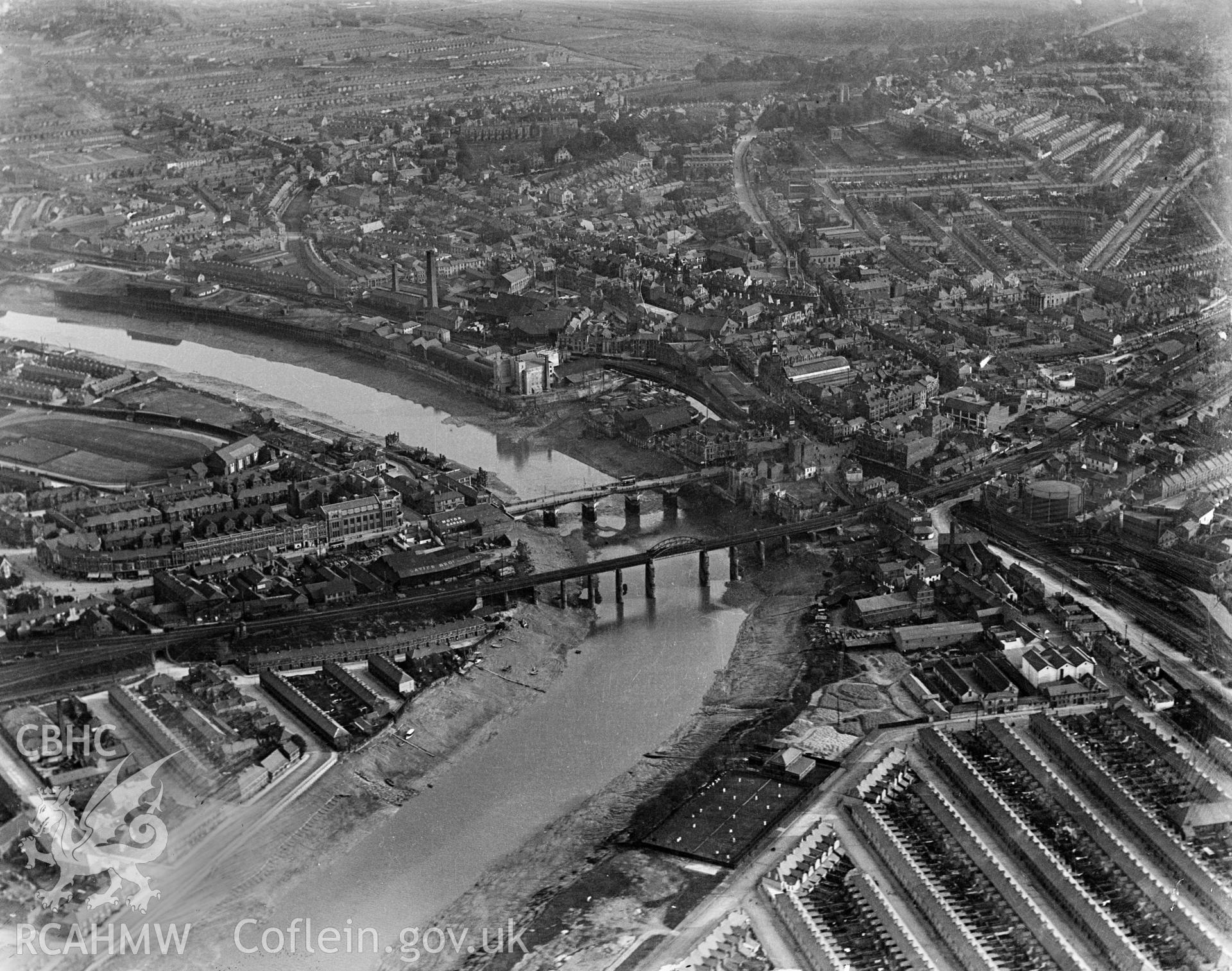 View of Newport showing railway and road bridges, oblique aerial view. 5?x4? black and white glass plate negative.