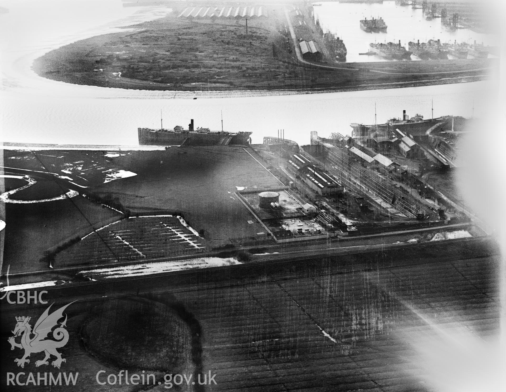View of British Oil Storage Co., Union Dry Dock, Newport, oblique aerial view. 5?x4? black and white glass plate negative.