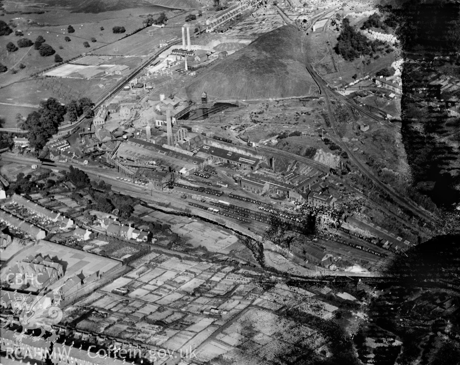 View of Aberaman colliery, also showing Godreaman and Abercwmboi in the Cynon Valley, oblique aerial view. 5?x4? black and white glass plate negative.