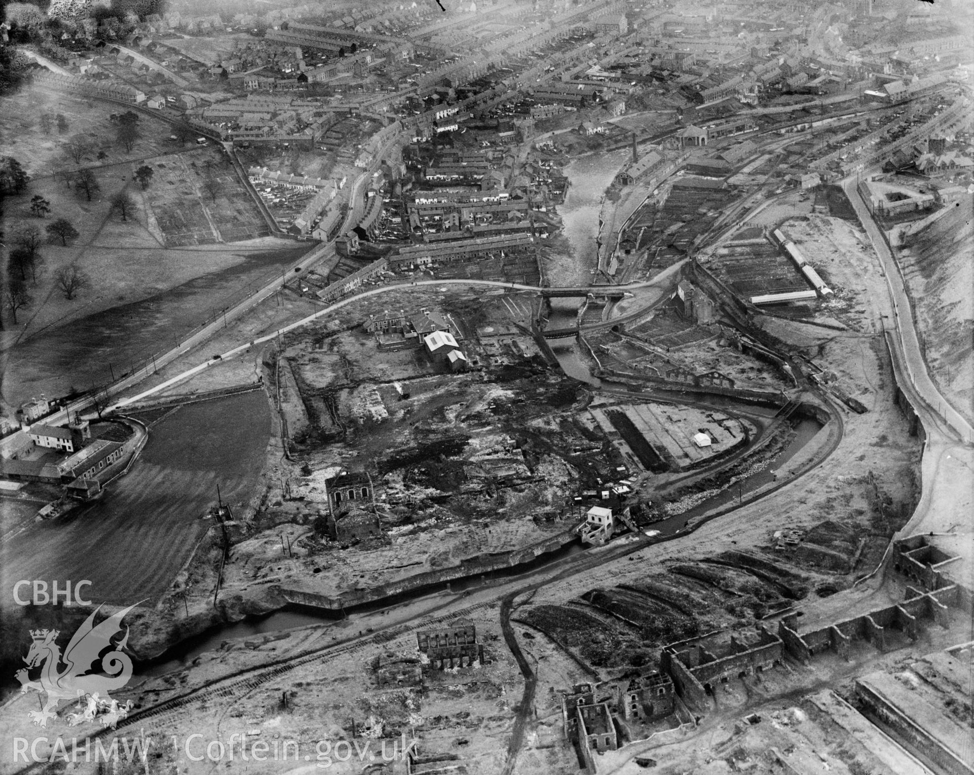 View of Williamstown, Merthyr Tydfil, showing ruined ironworks, oblique aerial view. 5?x4? black and white glass plate negative.
