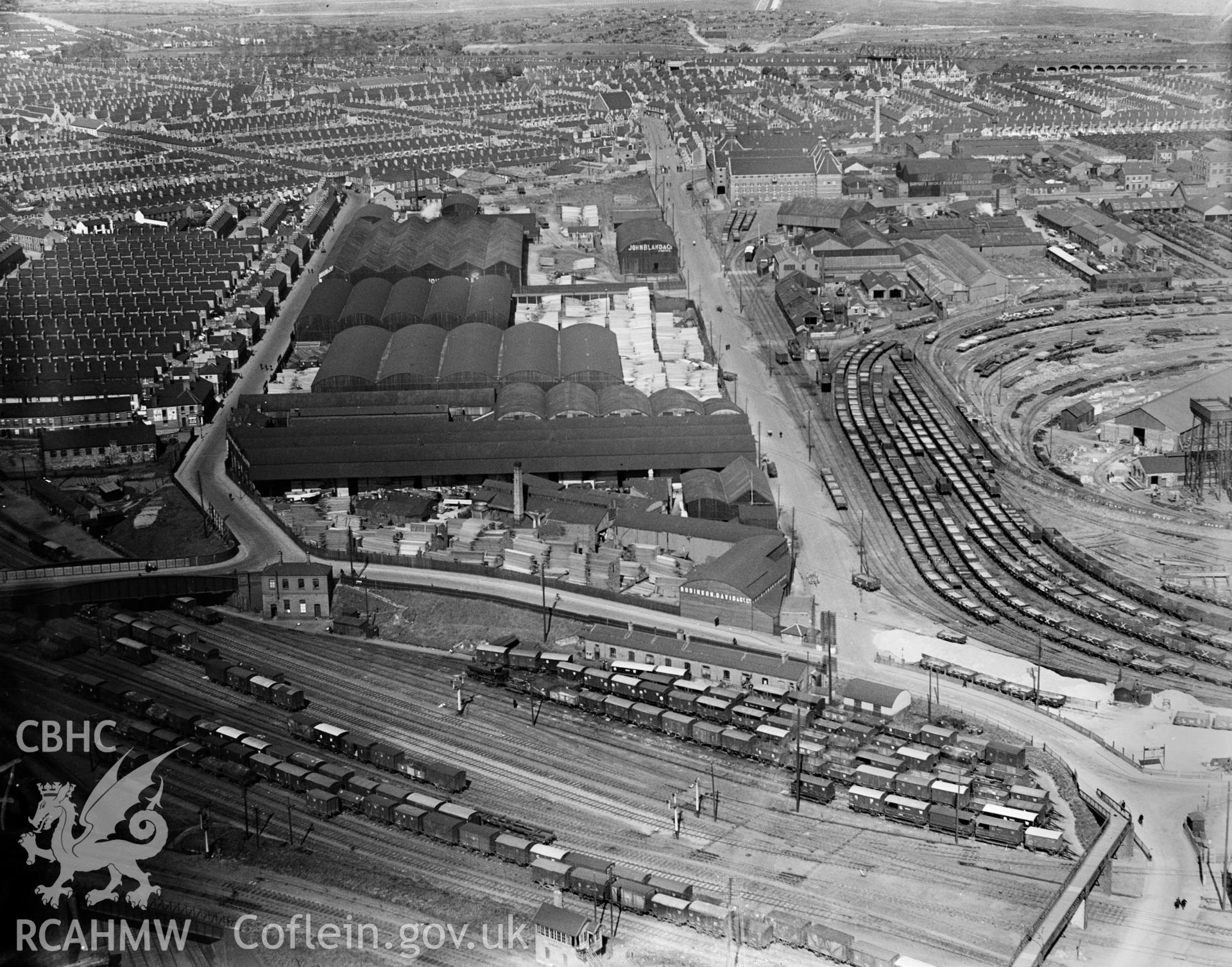 View of Robinson David timber company, Cardiff, oblique aerial view. 5?x4? black and white glass plate negative.