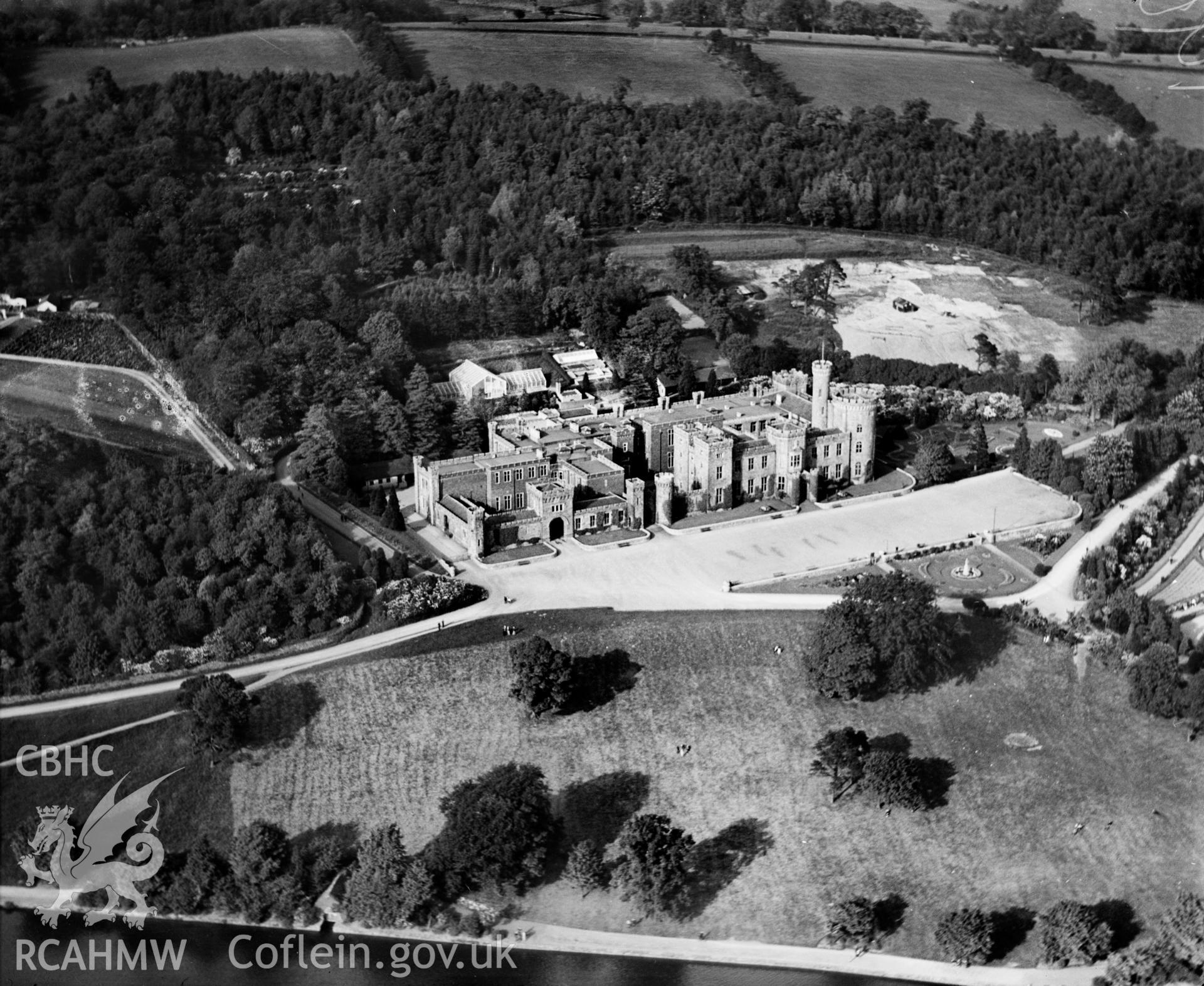 View of Cyfarthfa Castle, Merthyr Tydfil, oblique aerial view. 5?x4? black and white glass plate negative.