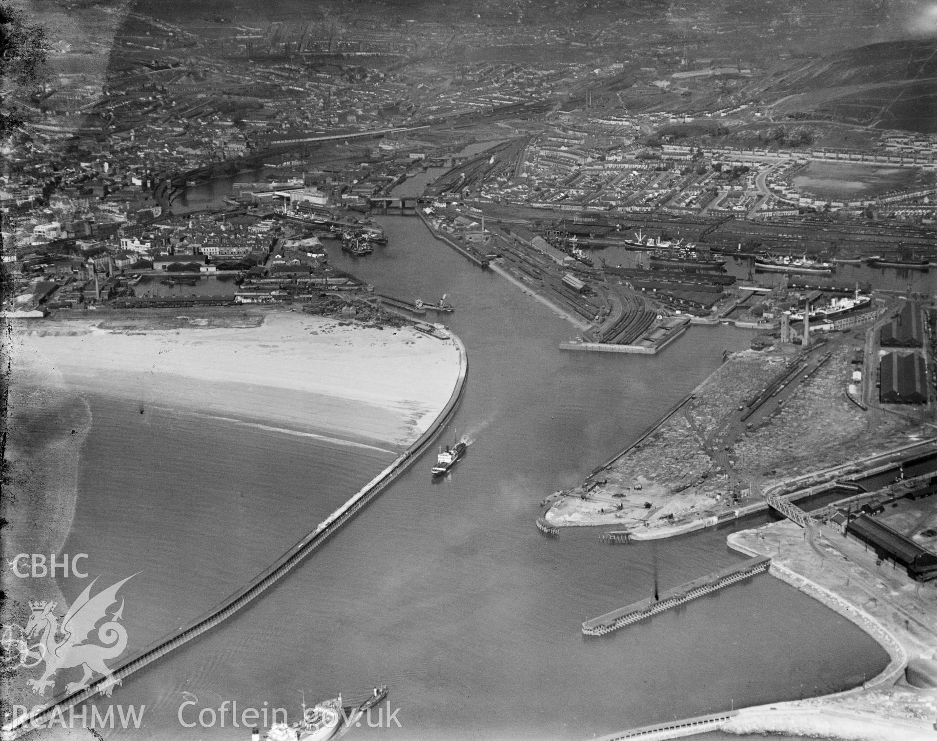 Black and white oblique aerial photograph showing Swansea Docks, from Aerofilms album Swansea (W30), taken by Aerofilms Ltd and dated 1929.