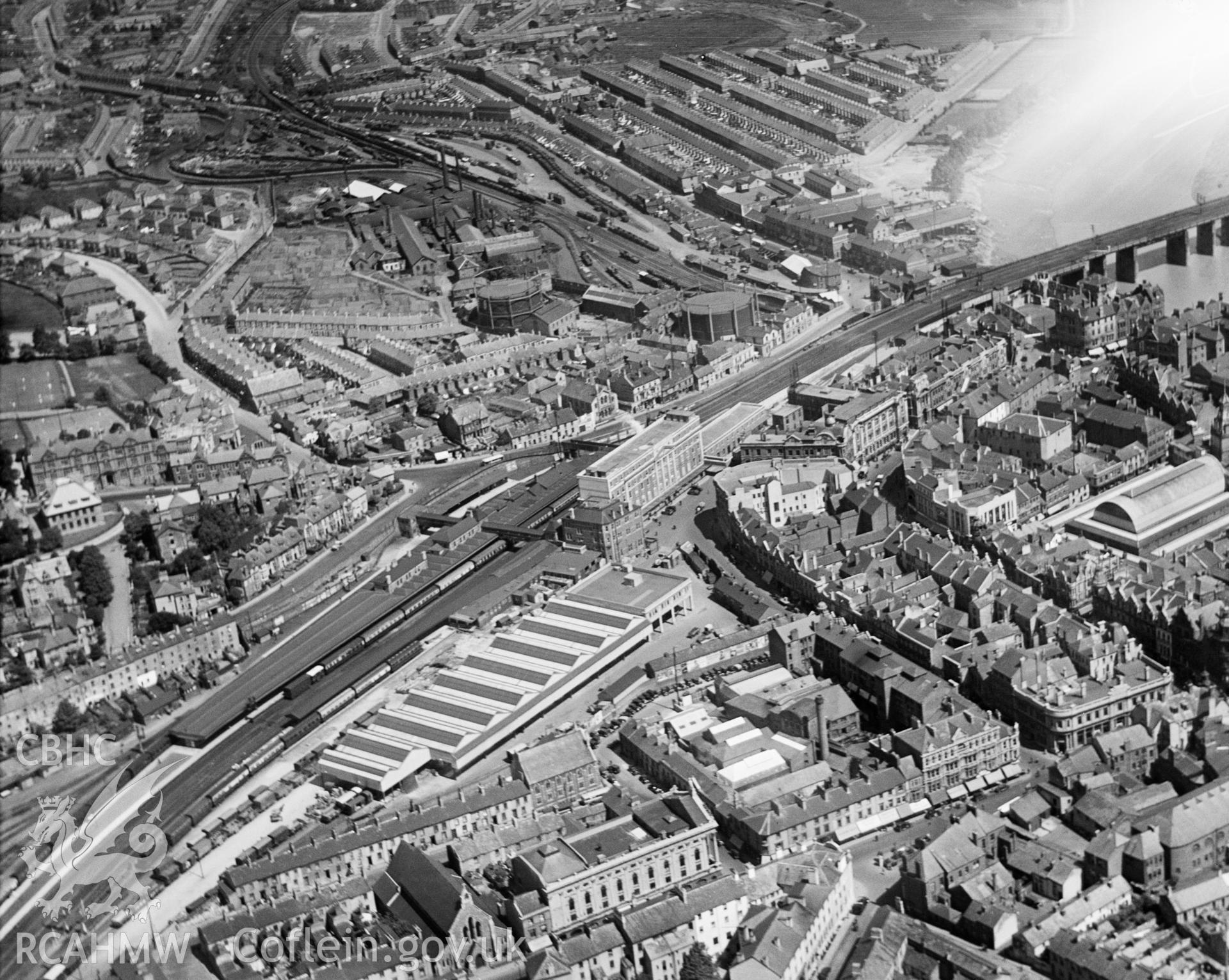 Black and white oblique aerial photograph showing High Street Railway Station, Newport, Gwent, from Aerofilms album Monmouth N-Pe (448), taken by Aerofilms Ltd and dated 1930.