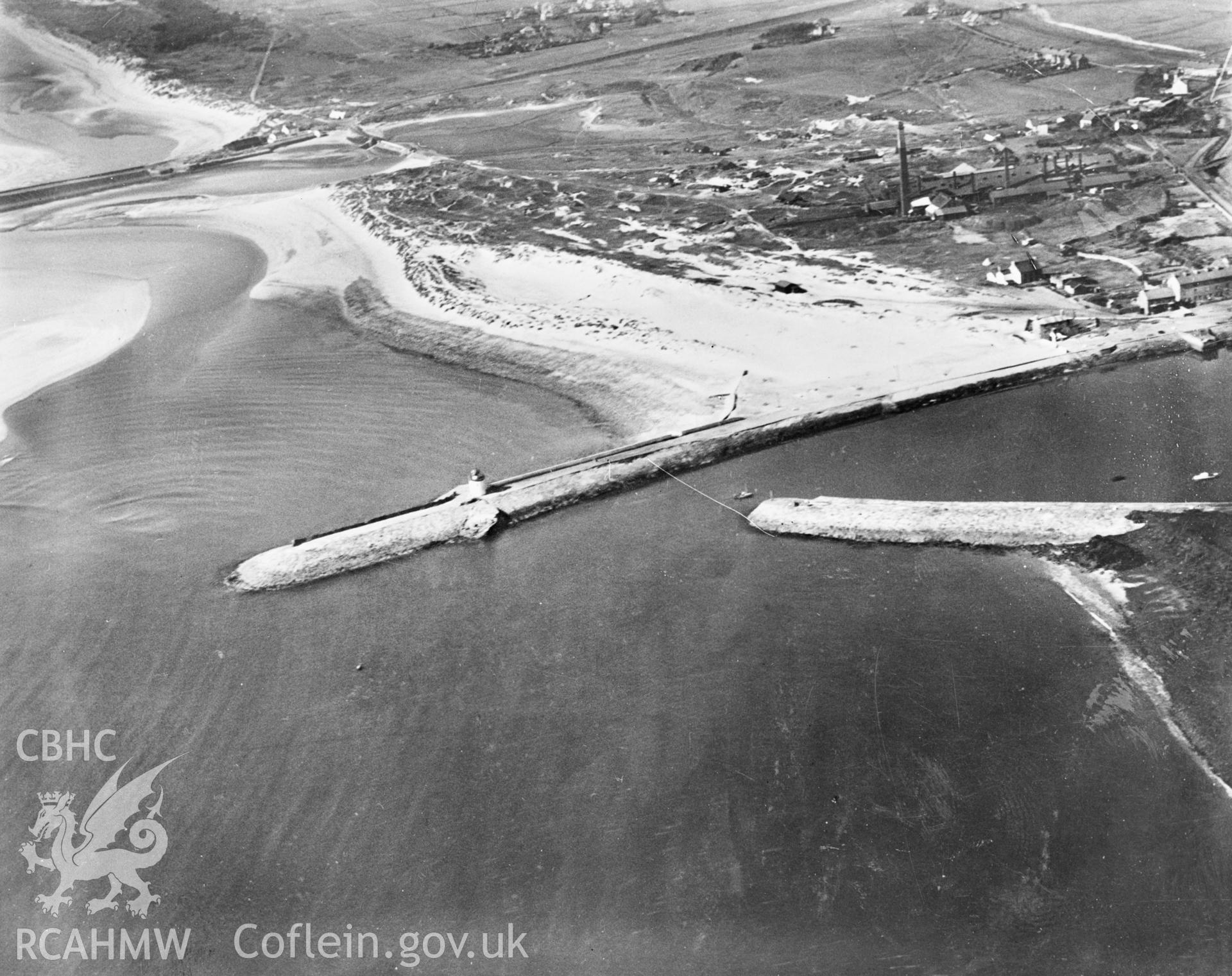 View of Burry Port pier and lighthouse with Ashburnham Tinplate Works. Oblique aerial photograph, 5?x4? BW glass plate.