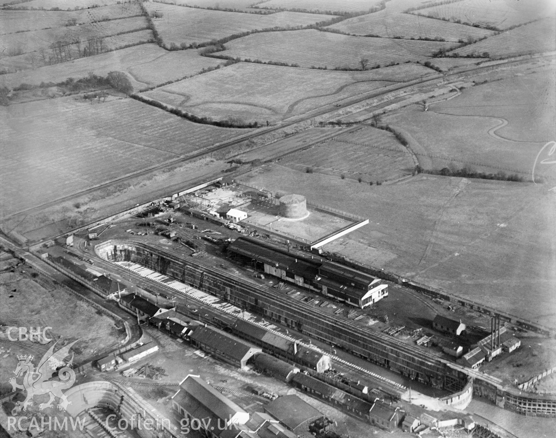 View of British Oil Storage Co., Union Dry Dock, Newport, oblique aerial view. 5?x4? black and white glass plate negative.