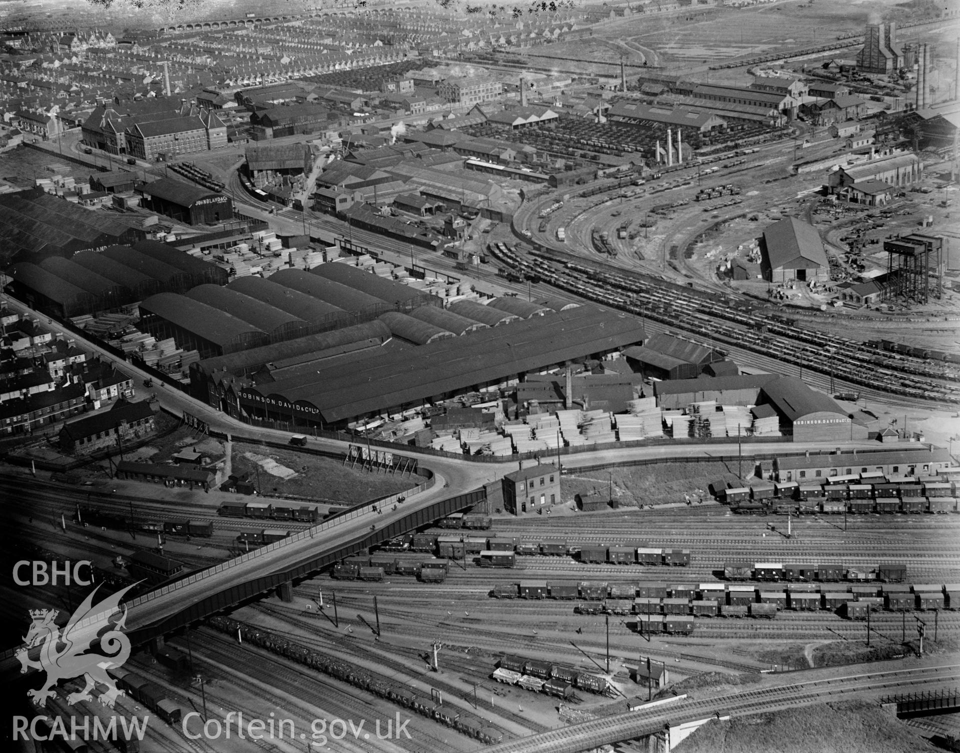 View of Robinson David timber company, Cardiff, oblique aerial view. 5?x4? black and white glass plate negative.