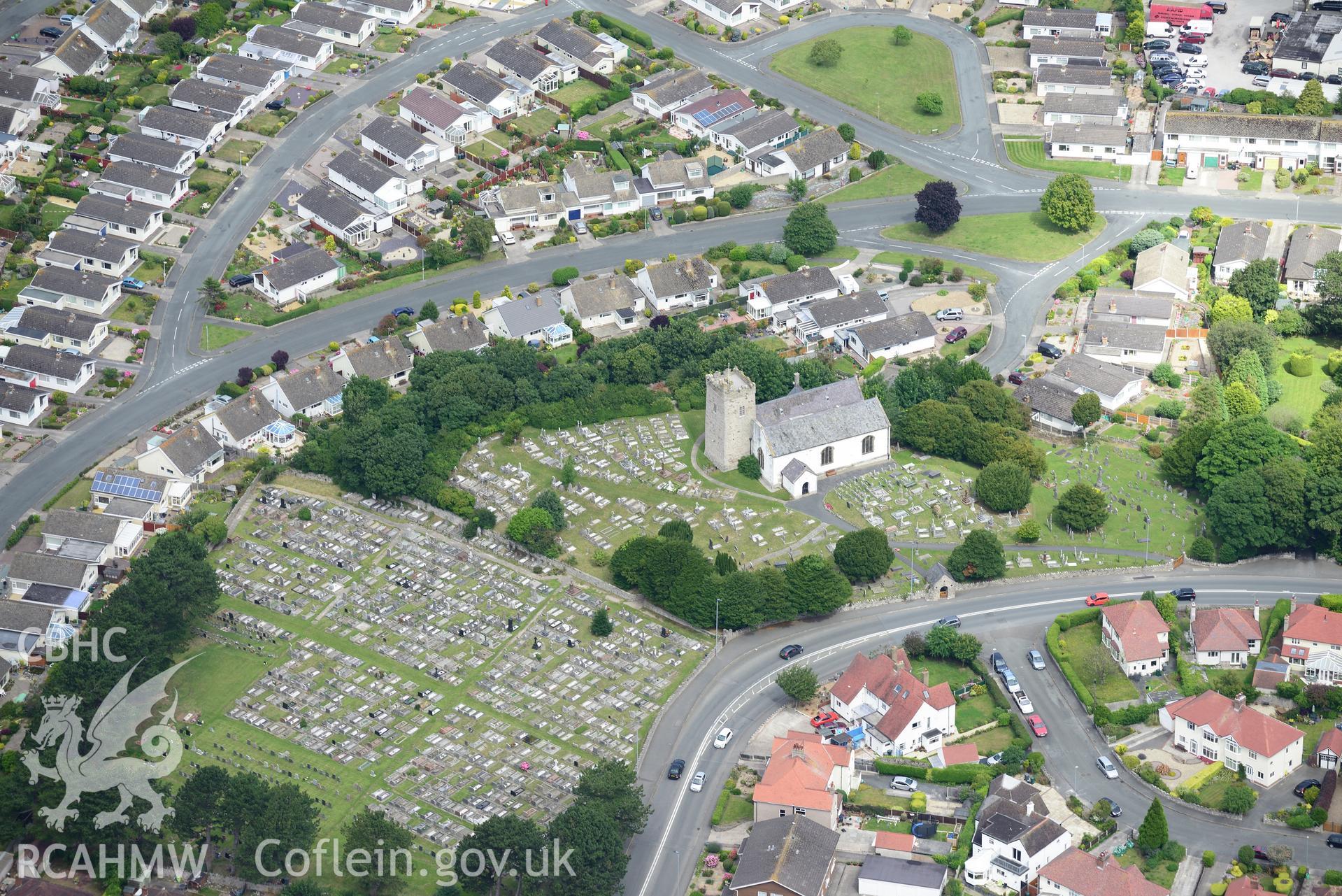 Rhos-on-Sea and St. Trillo's Church. Oblique aerial photograph taken during the Royal Commission's programme of archaeological aerial reconnaissance by Toby Driver on 30th July 2015.