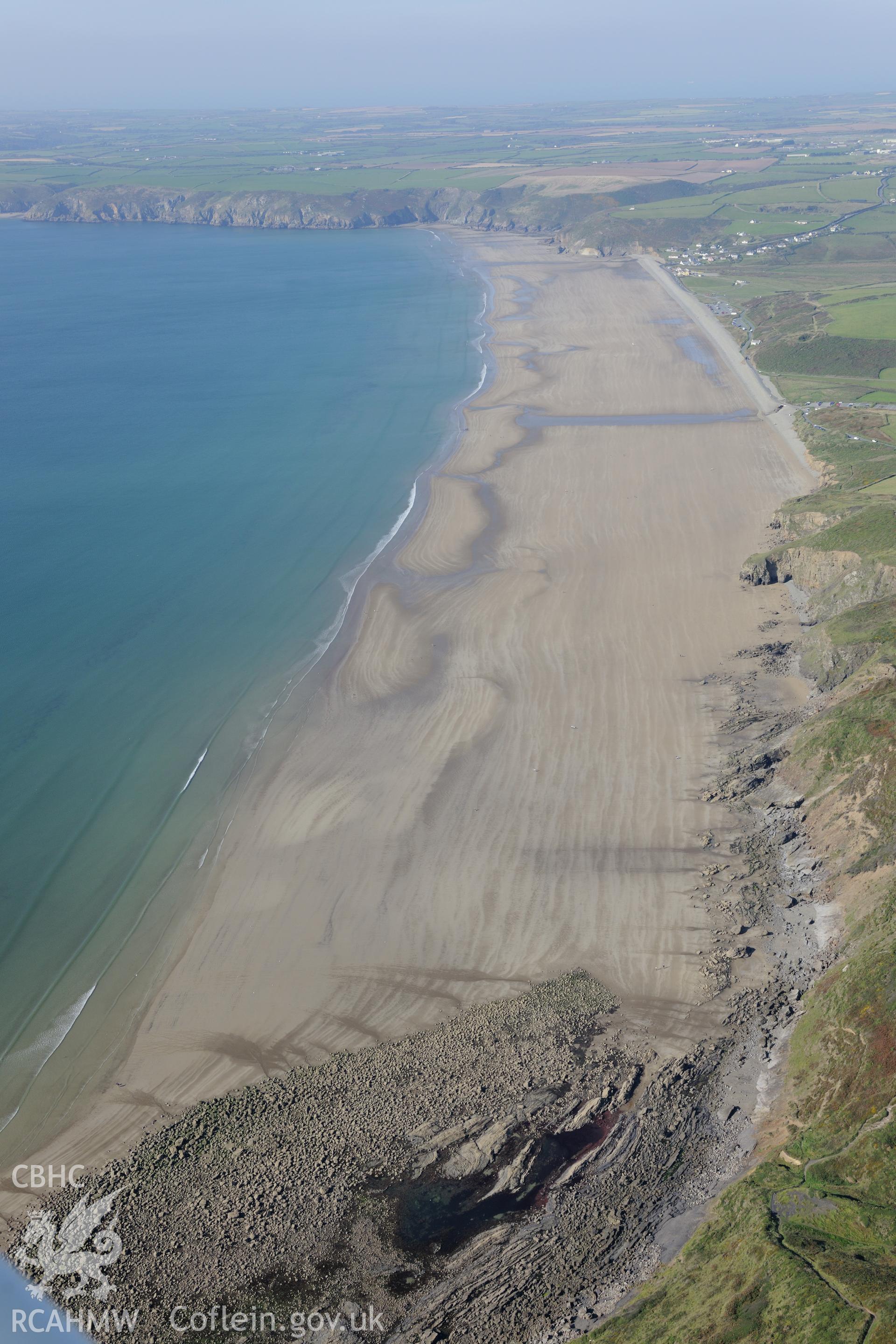 Newgale village and Newgale sands, north west of Haverford West. Oblique aerial photograph taken during the Royal Commission's programme of archaeological aerial reconnaissance by Toby Driver on 30th September 2015.