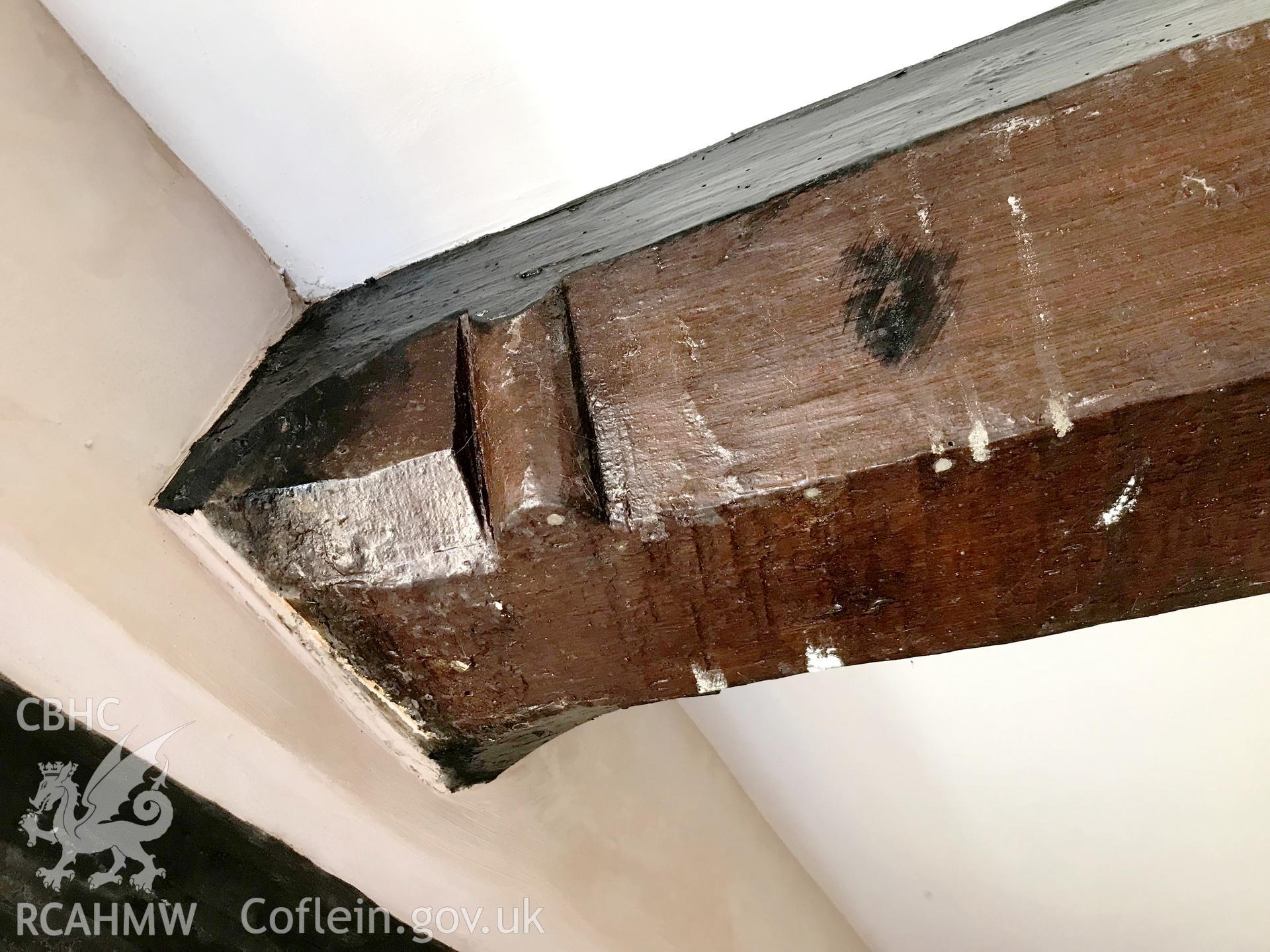 Digital colour photograph showing detailed view of wooden beam at Ty-Gwynn, Hospital Road, Pontnewynydd, taken by Paul R. Davis on 13th August 2019.