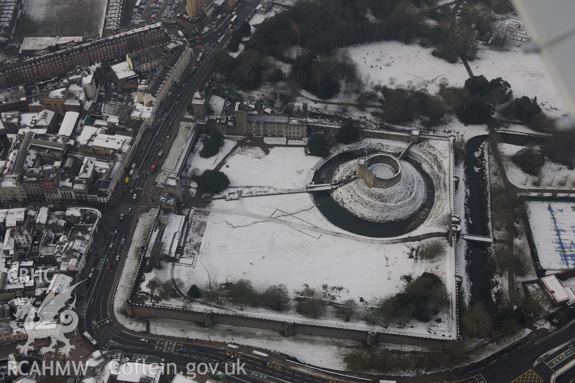 Cardiff Castle and Cardiff Roman Settlement. Oblique aerial photograph taken during the Royal Commission?s programme of archaeological aerial reconnaissance by Toby Driver on 24th January 2013.