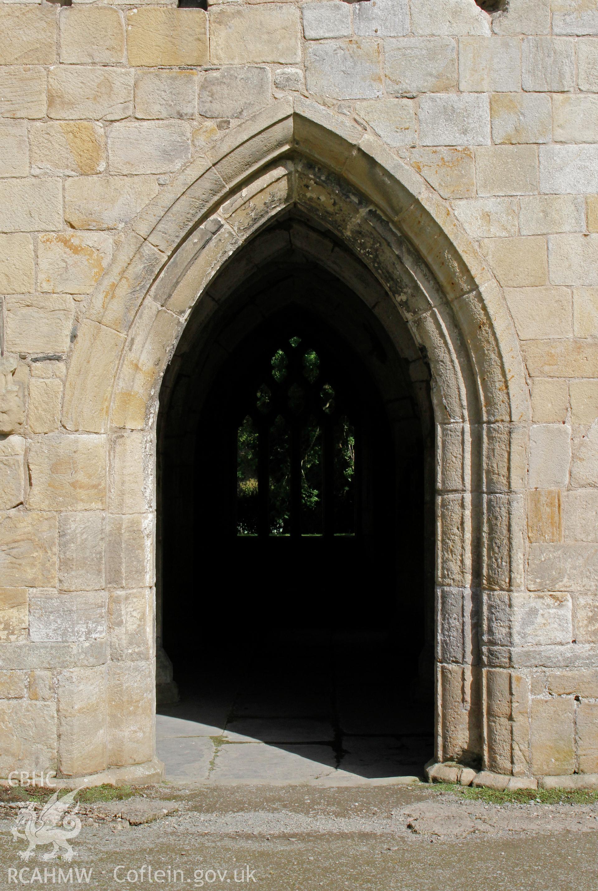 Valle Crucis Abbey: East range of cloisters from west - Sacristy door
