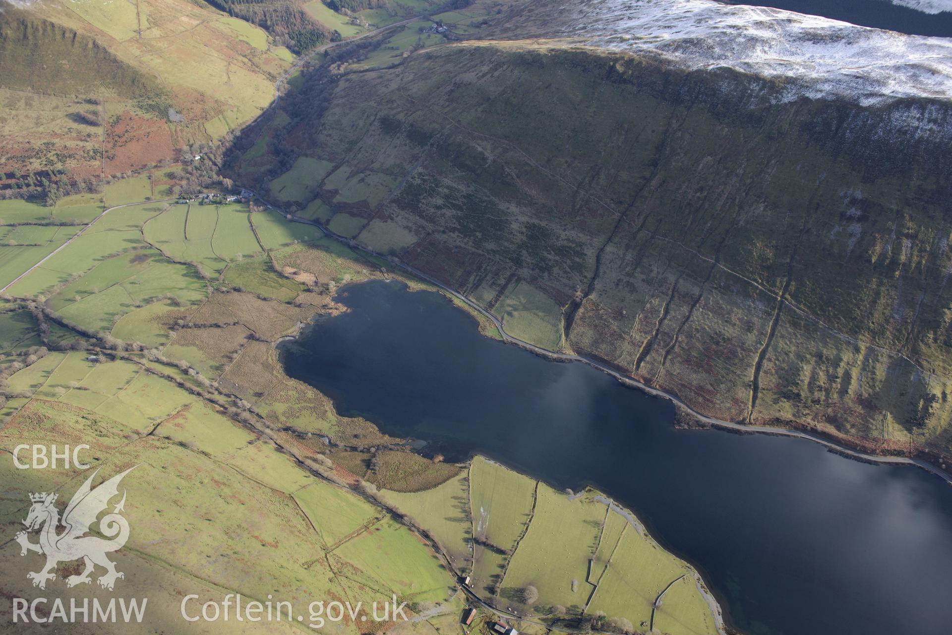 Tal-y-Llyn lake, south of Dolgellau. Oblique aerial photograph taken during the Royal Commission's programme of archaeological aerial reconnaissance by Toby Driver on 4th February 2015.