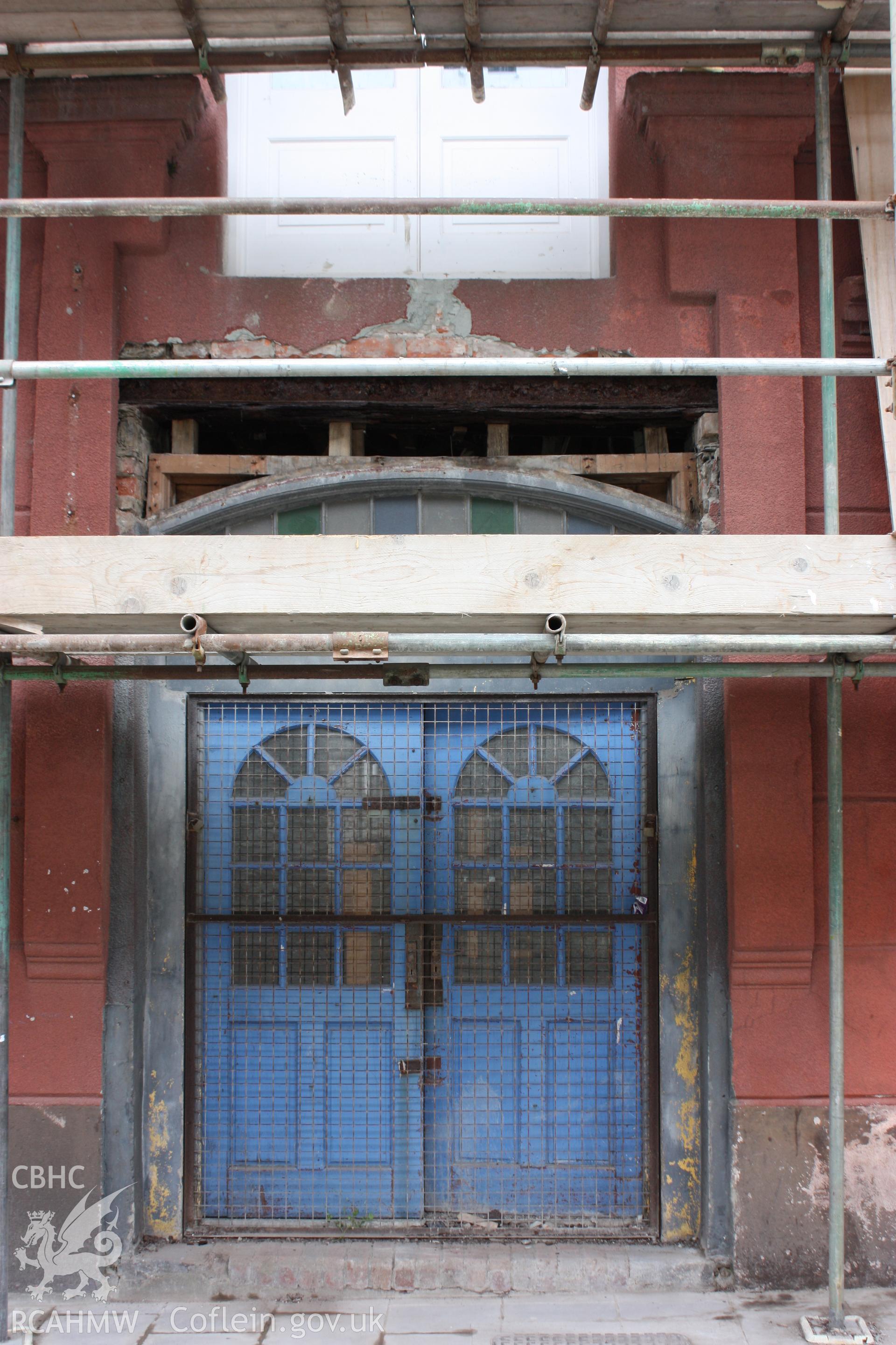 Colour photograph showing exterior view of ground floor double doors at the Old Auction Rooms/ Liberal Club in Aberystwyth. Photographic survey conducted by Geoff Ward on 9th June 2010 during repair work prior to conversion into flats.