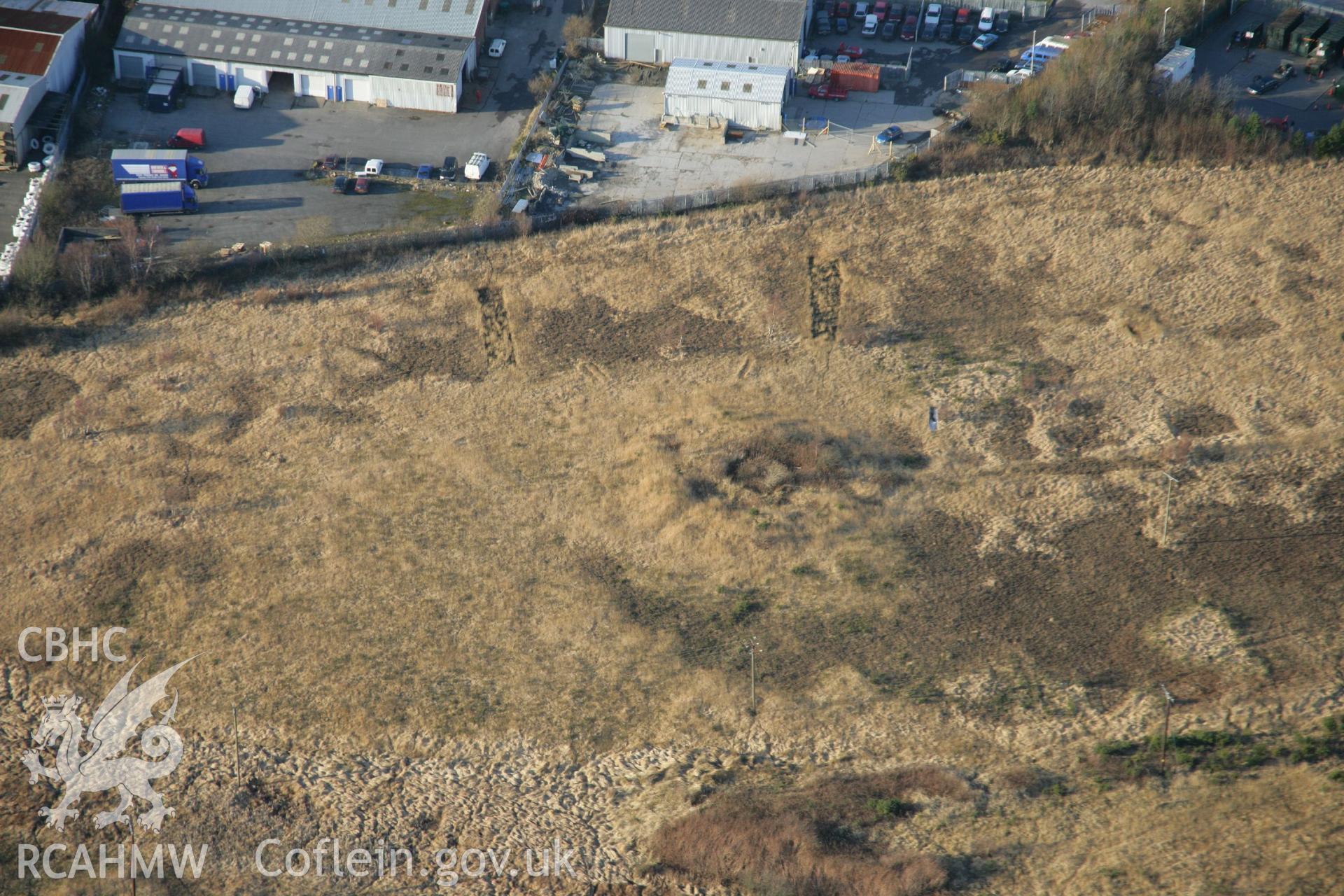 Oblique aerial photograph taken during the Royal Commission?s programme of archaeological aerial reconnaissance by Toby Driver in 2006. Used in Setting Impact Assessment of Land near Garngoch Business Village, Swansea, by Archaeology Wales, 2018.