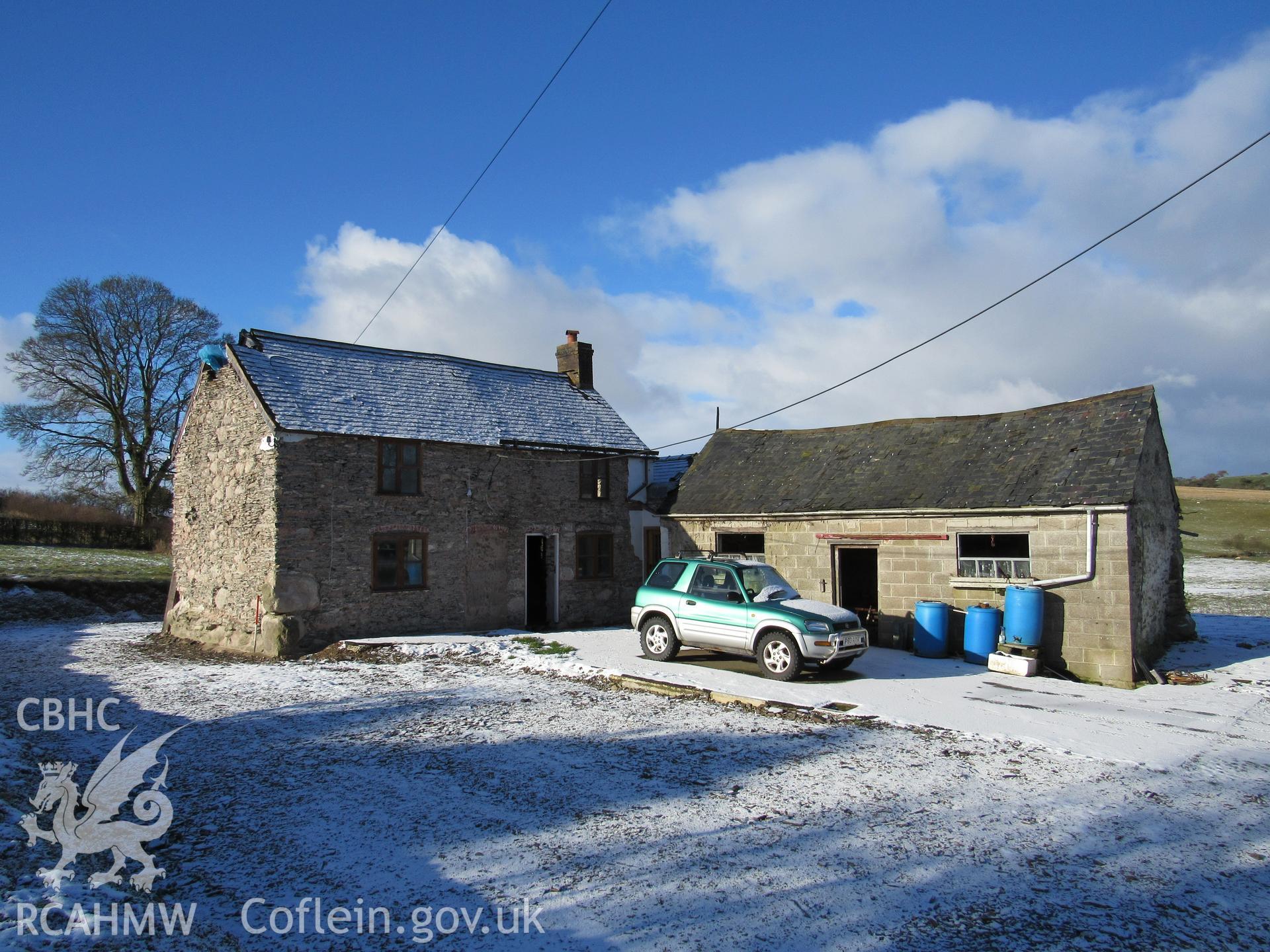The house and barn, view west. Photographs as part of archaeological building recording conducted at Bryn Ysguboriau, Llanelidan, Denbighshire, carried out by Archaeology Wales, 2018. Project no. P2587.