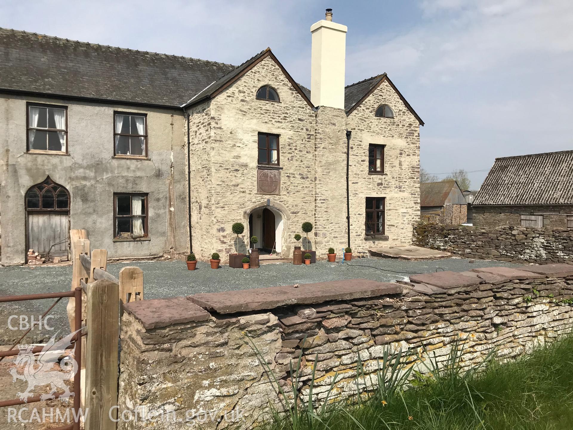 Digital colour photograph showing exterior view of the front elevation of College Farmhouse, Trefecca, Talgarth, taken by Paul R. Davis on 22nd April 2019.