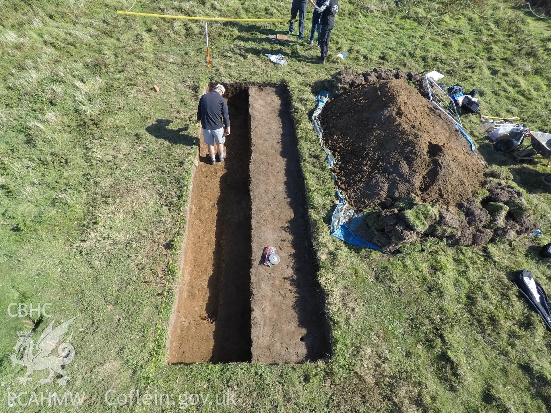 Investigator's photography showing the evaluation excavation of a geophysical anomaly in Well Meadow, Skomer Island, between 25-27th Sept 2018 as part of the Skomer Island Project. High view of trench from west.