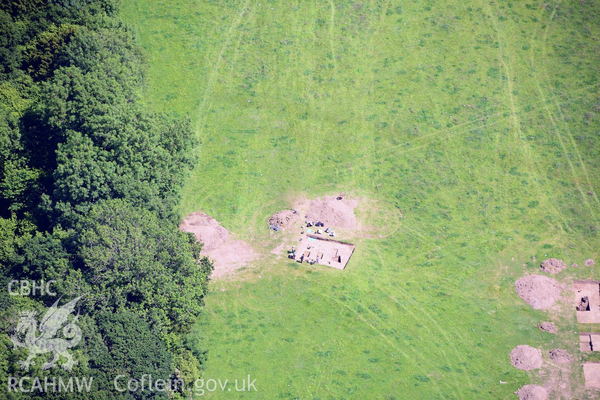 Excavation of Caerau Hillfort, Ely, conducted by Cardiff University. Oblique aerial photograph taken during the Royal Commission's programme of archaeological aerial reconnaissance by Toby Driver on 29th June 2015.