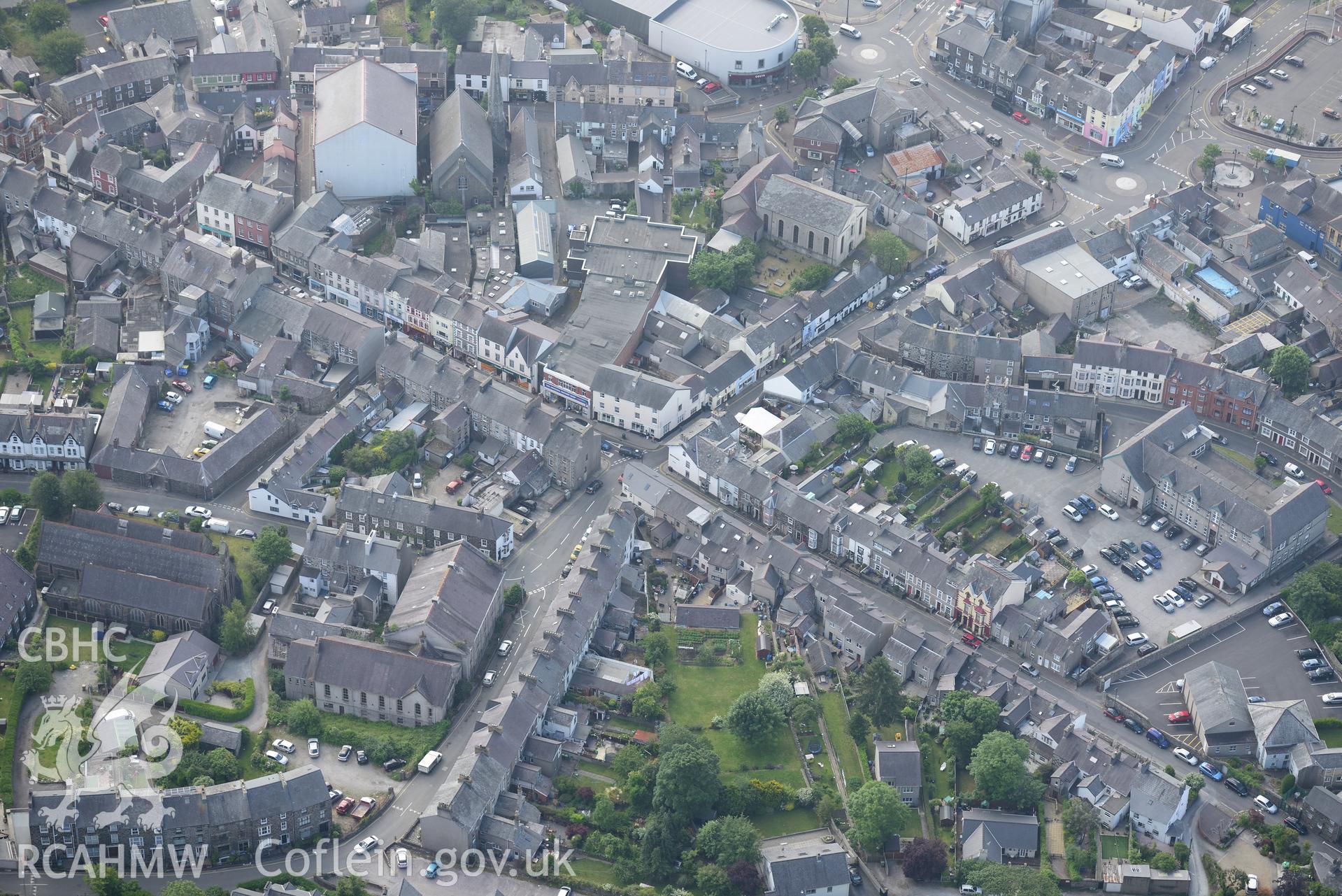 Pen-Lan Welsh Independent Chapel and St Peters Church in the town of Pwllheli. Oblique aerial photograph taken during the Royal Commission's programme of archaeological aerial reconnaissance by Toby Driver on 23rd June 2015.